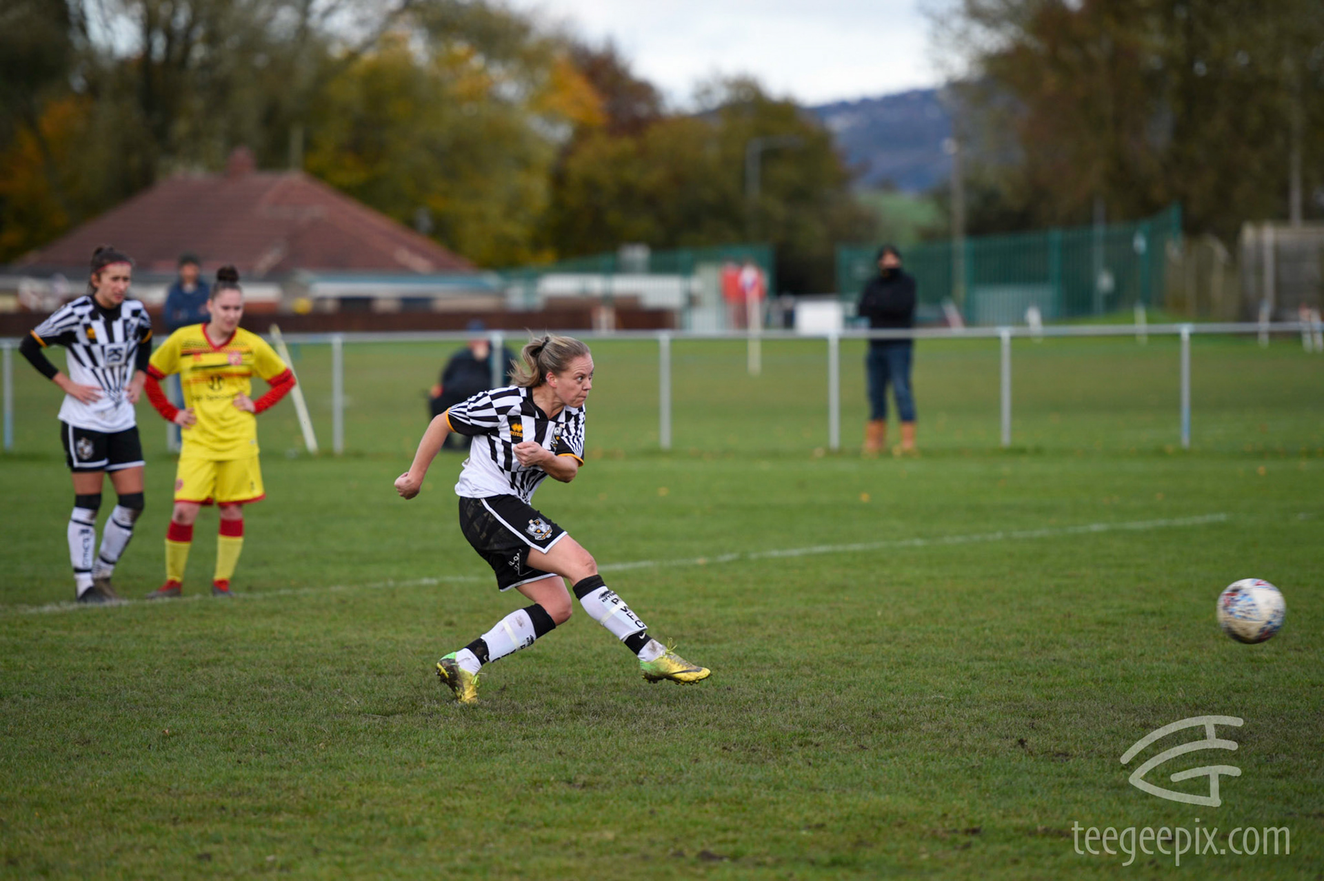 Kim Cartlidge strikes the ball goalwards to make it 4-0 to Vale