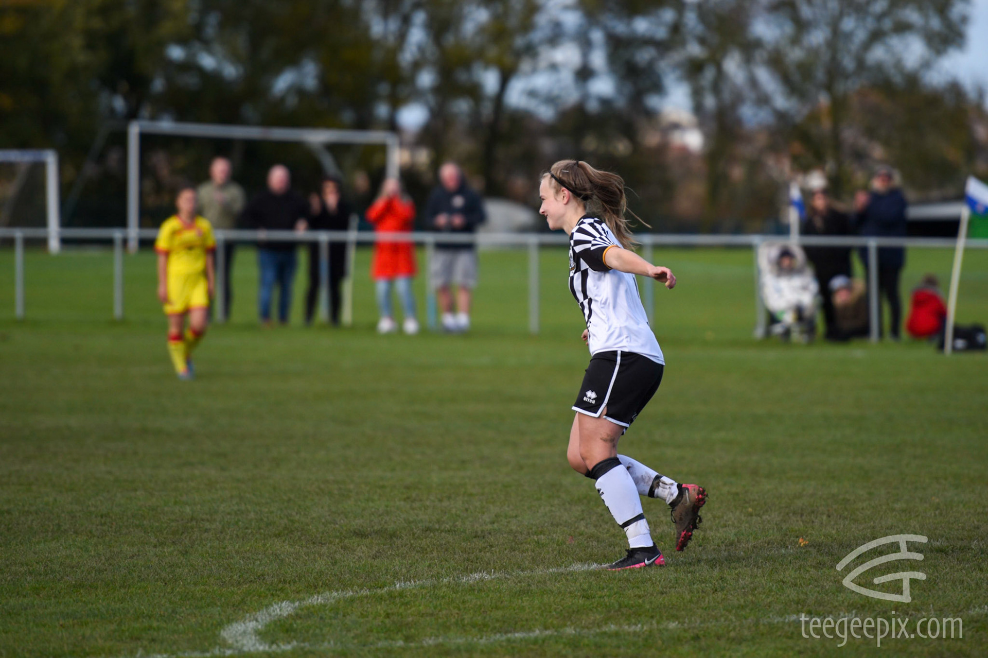 Hollie Edwards celebrates however the flag has been raised for offside