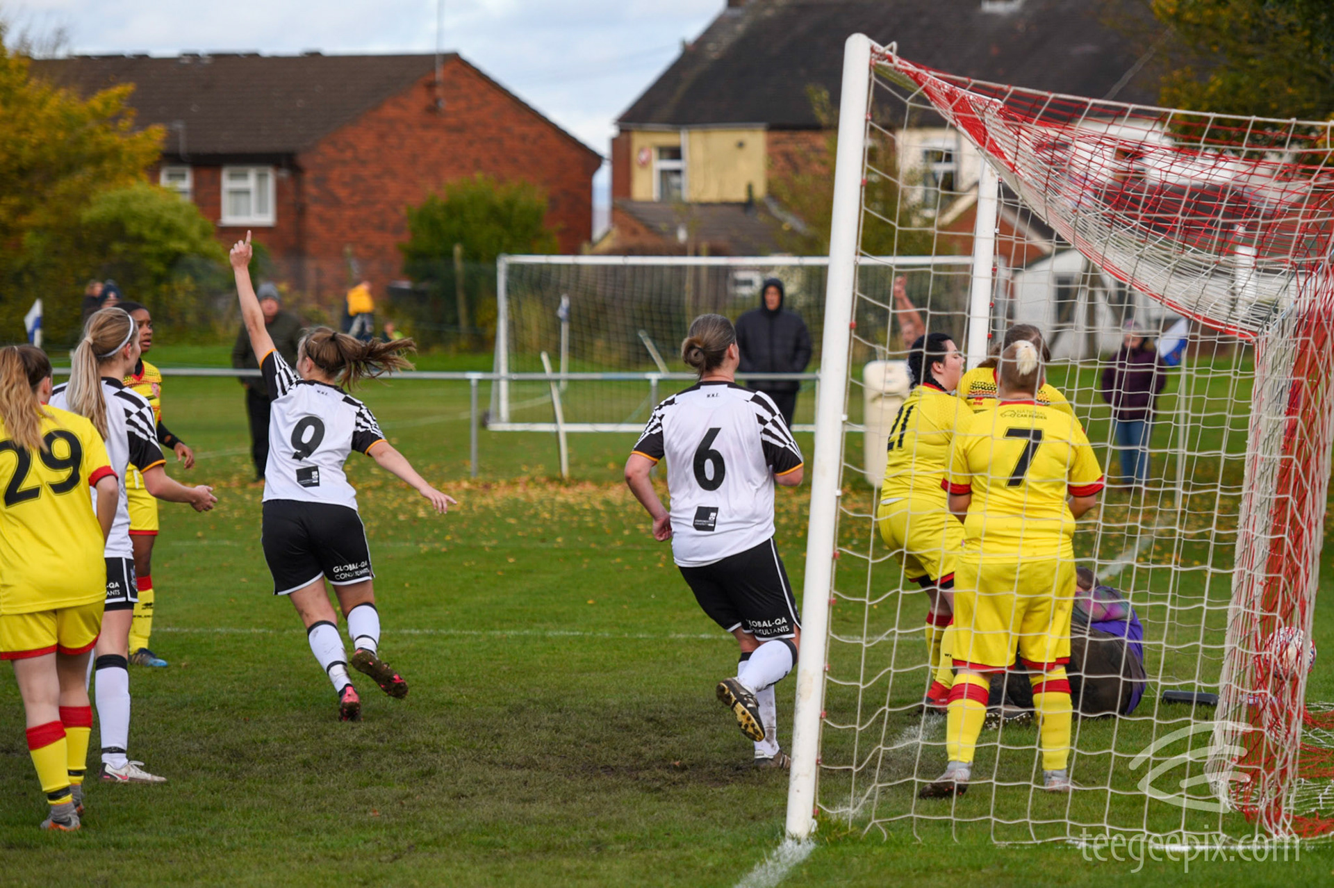 Holly Edwards celebrates as the ball finds it's way over the line to make it 3-0 to Vale