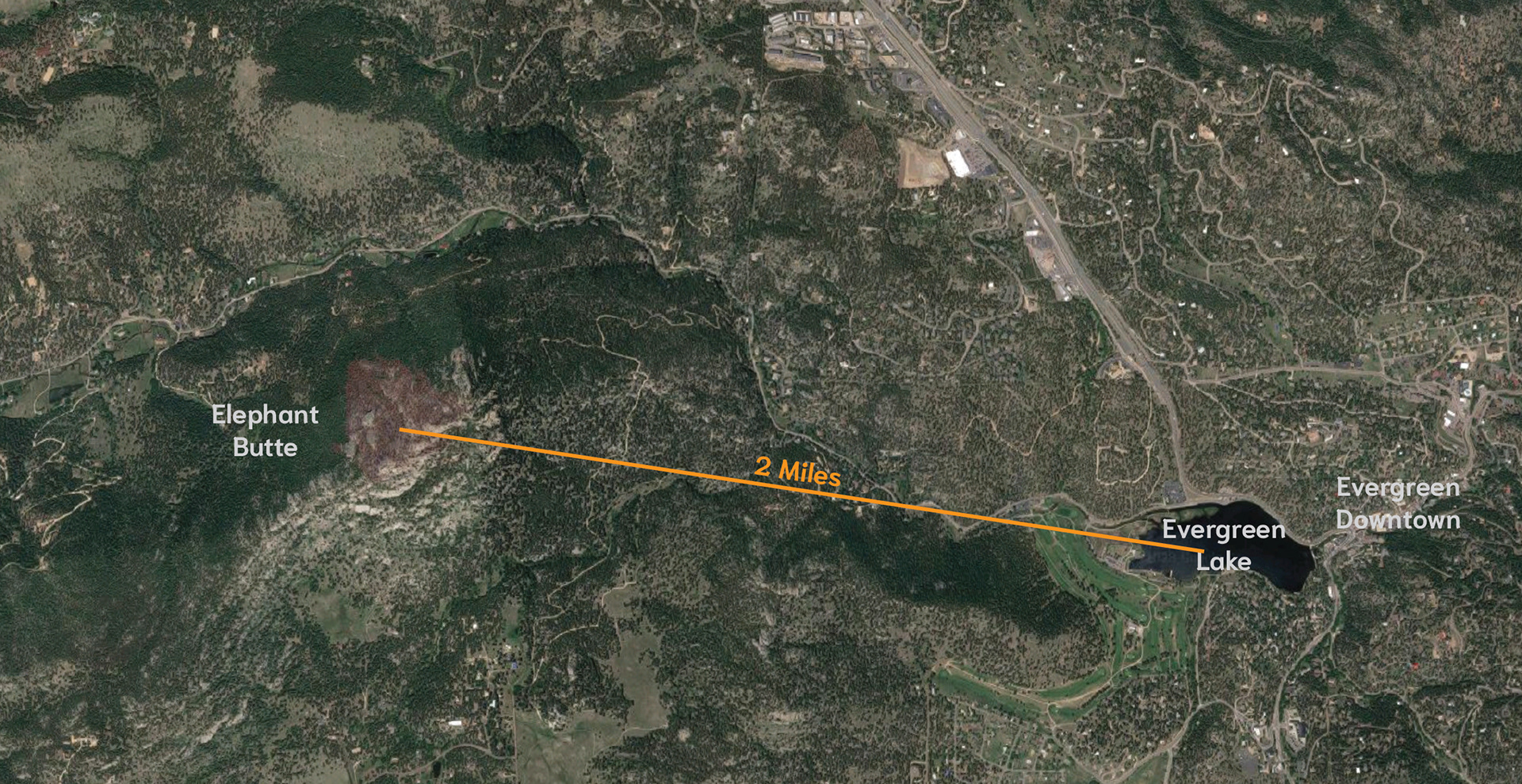 Elephant Butte is a local prominence situated in Evergreen, CO. The butte and land around it is owned by Denver Mountain Parks. The lake was used by the helicopters to refill © 2022 Geoffrey Erdahl