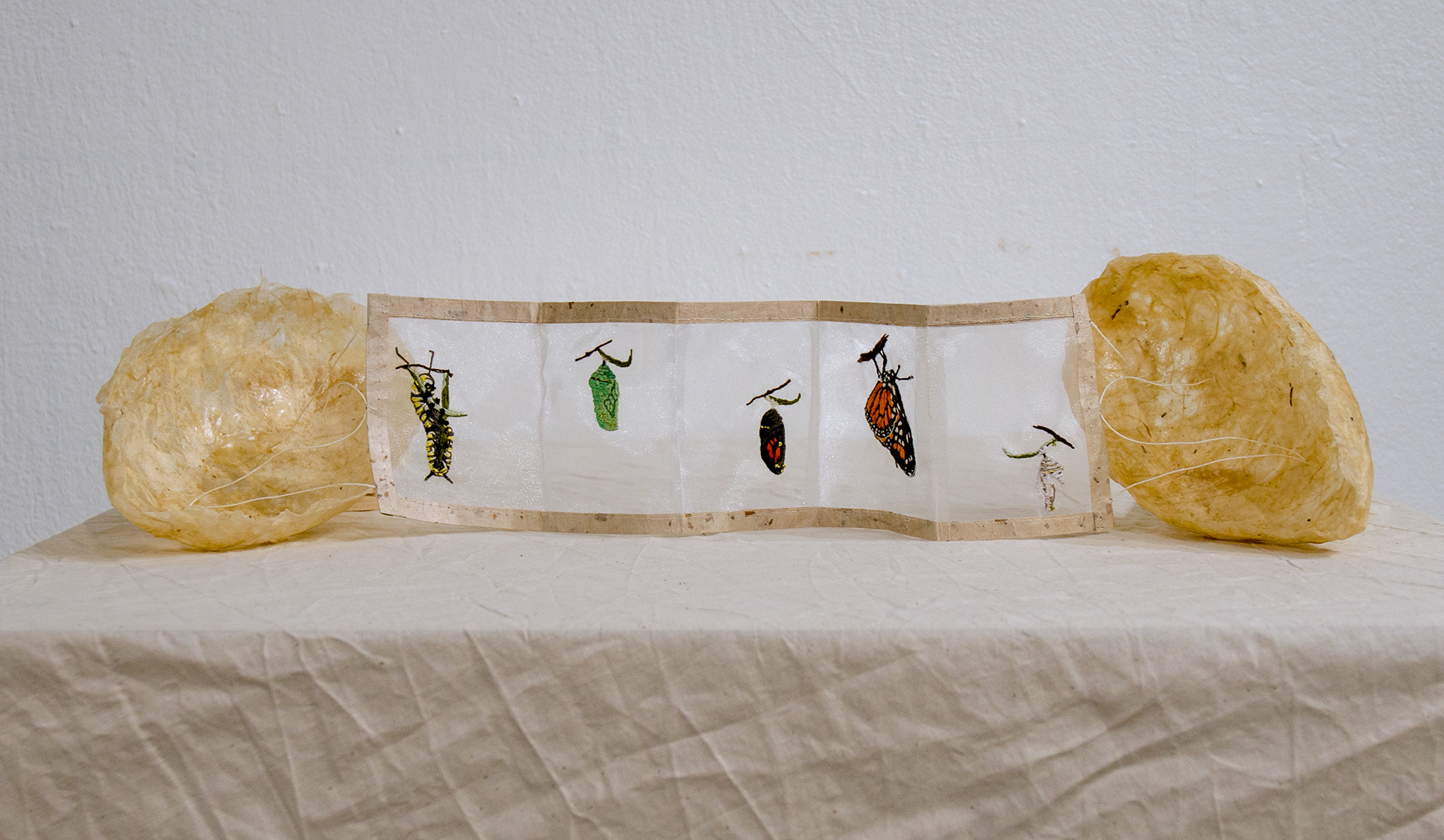 'Monarch,' 2023. Papier-mâché, hand embroidery on organza.