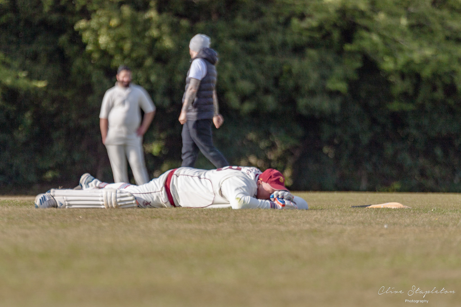 Graham Wickens dives at the batting crease to avoid being run out whilst playing for New Bradwell 2nd XI.