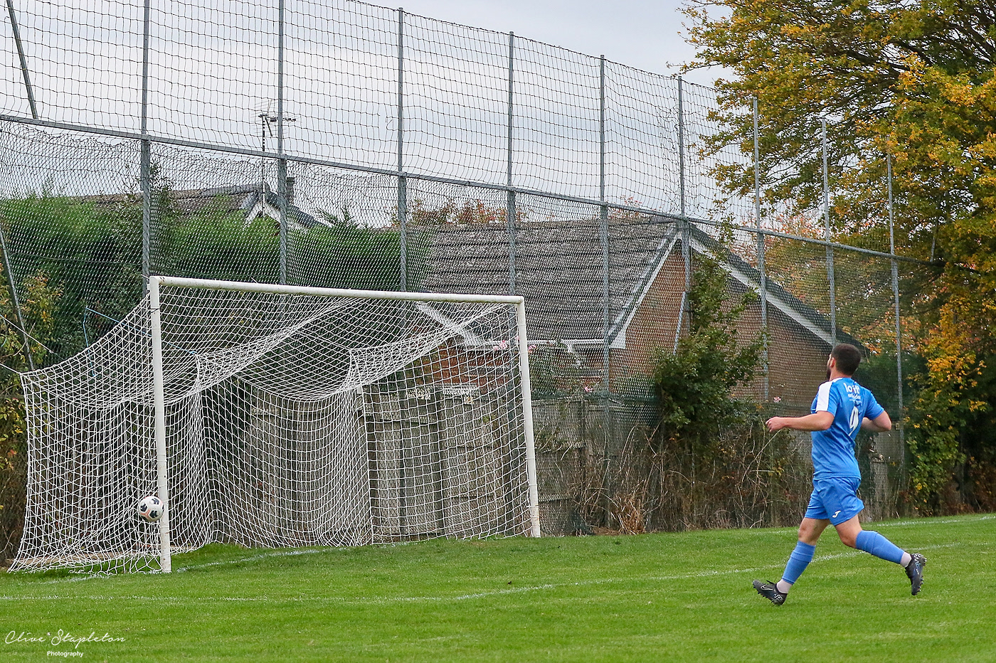 The shot narrowly passes the post