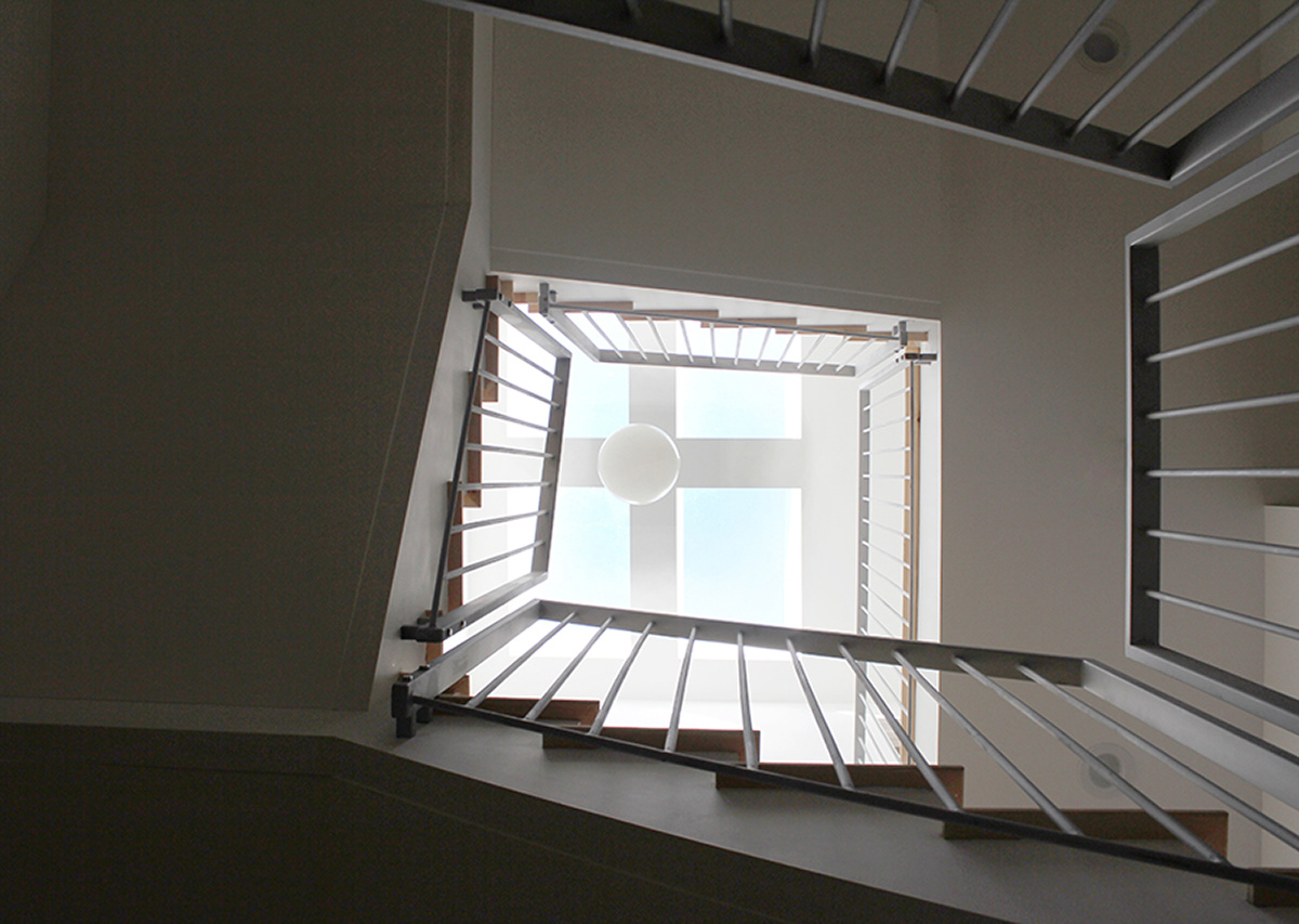 View up through stair at Lewis Vinz residential renovation in Chicago