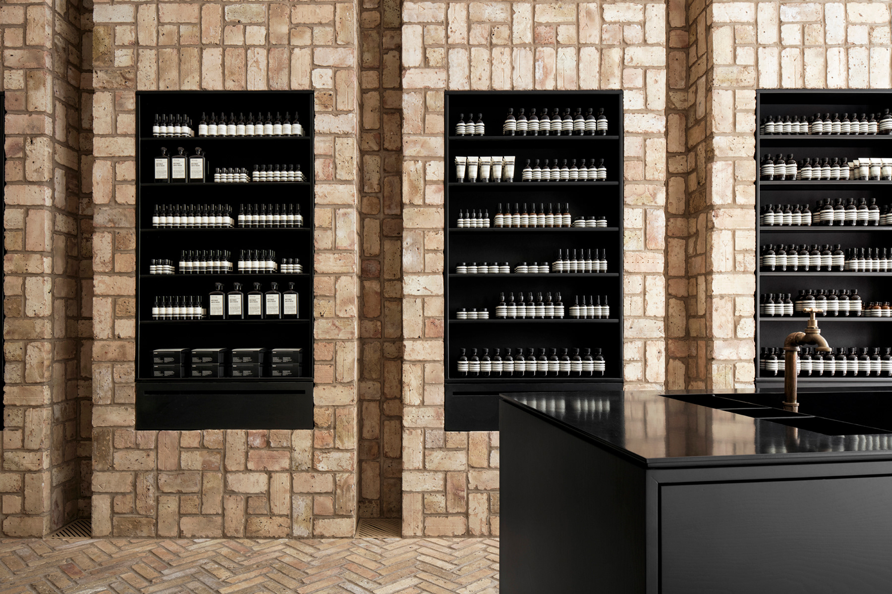 View of merchandise display at Aesop Bucktown retail renovation in Chicago