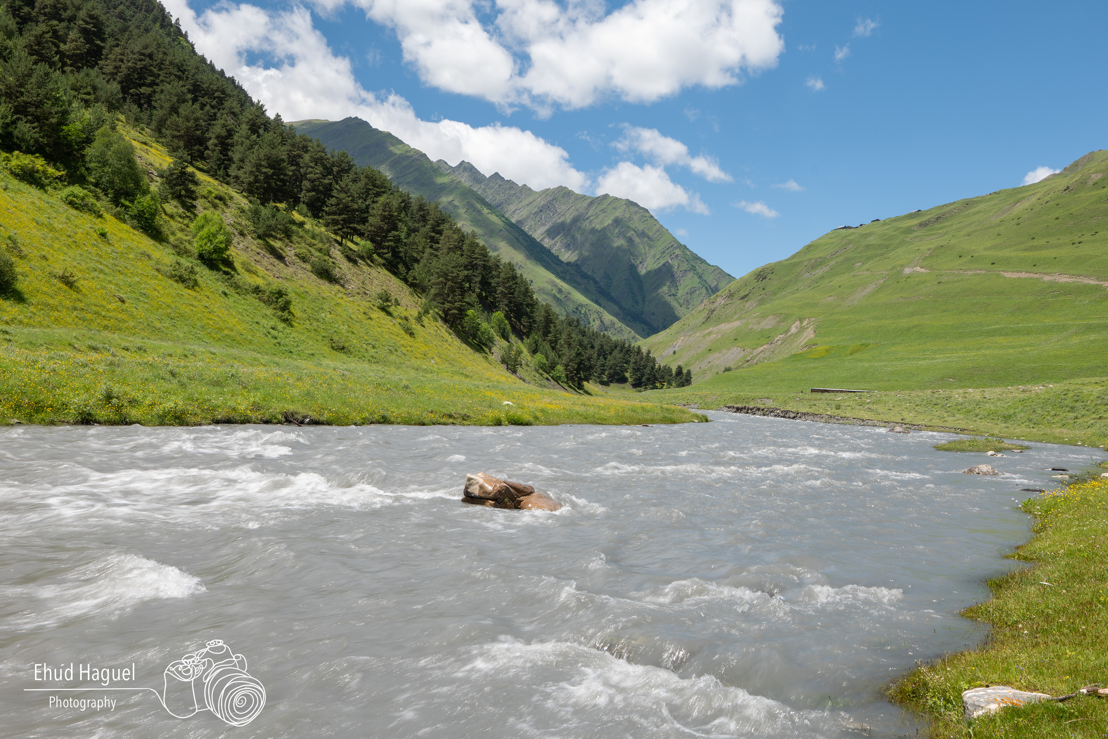 Mountain river flowing through Tusheti valley, landscape photography Georgia