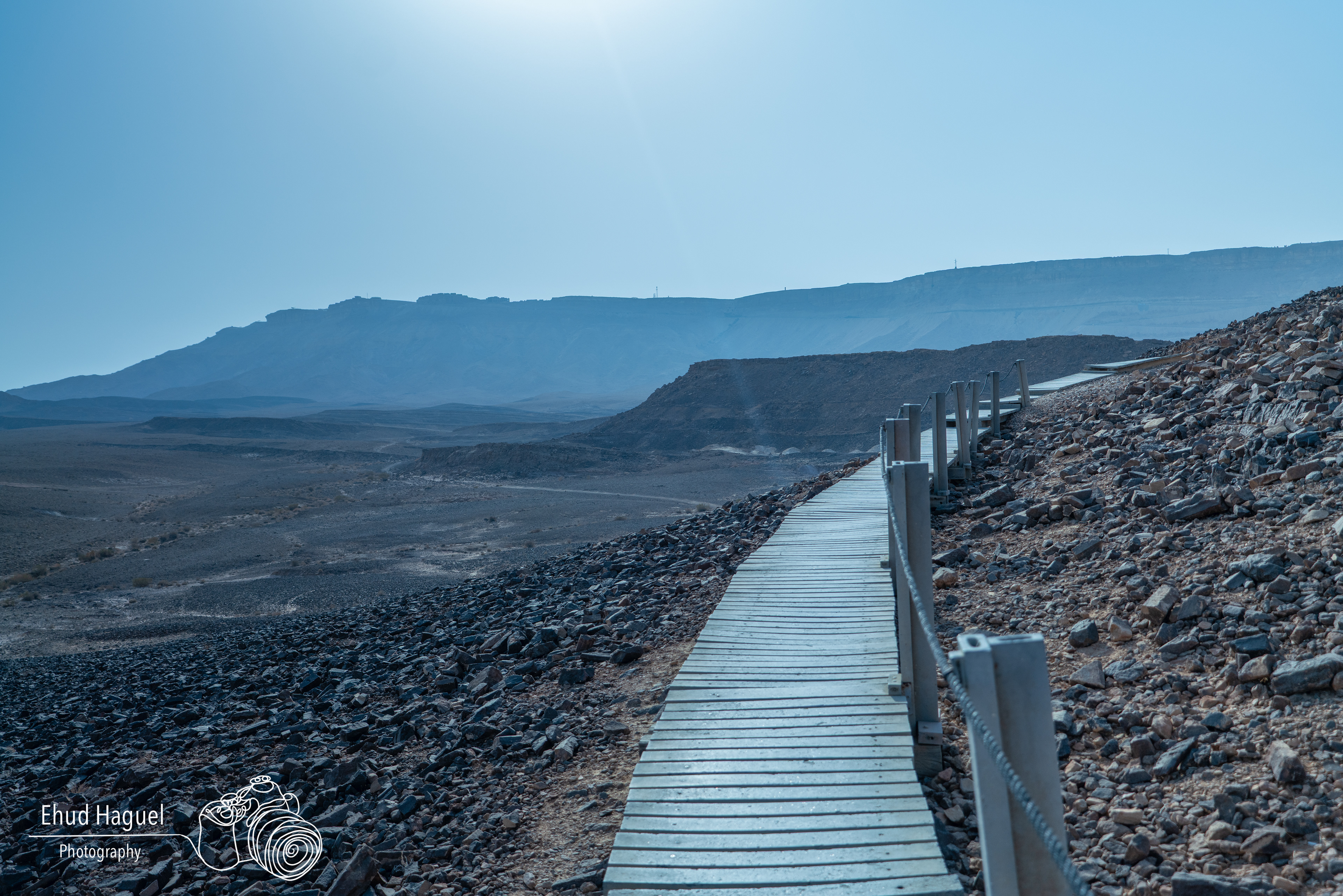 Wooden boardwalk through desert landscape, Mitzpe Ramon Israel