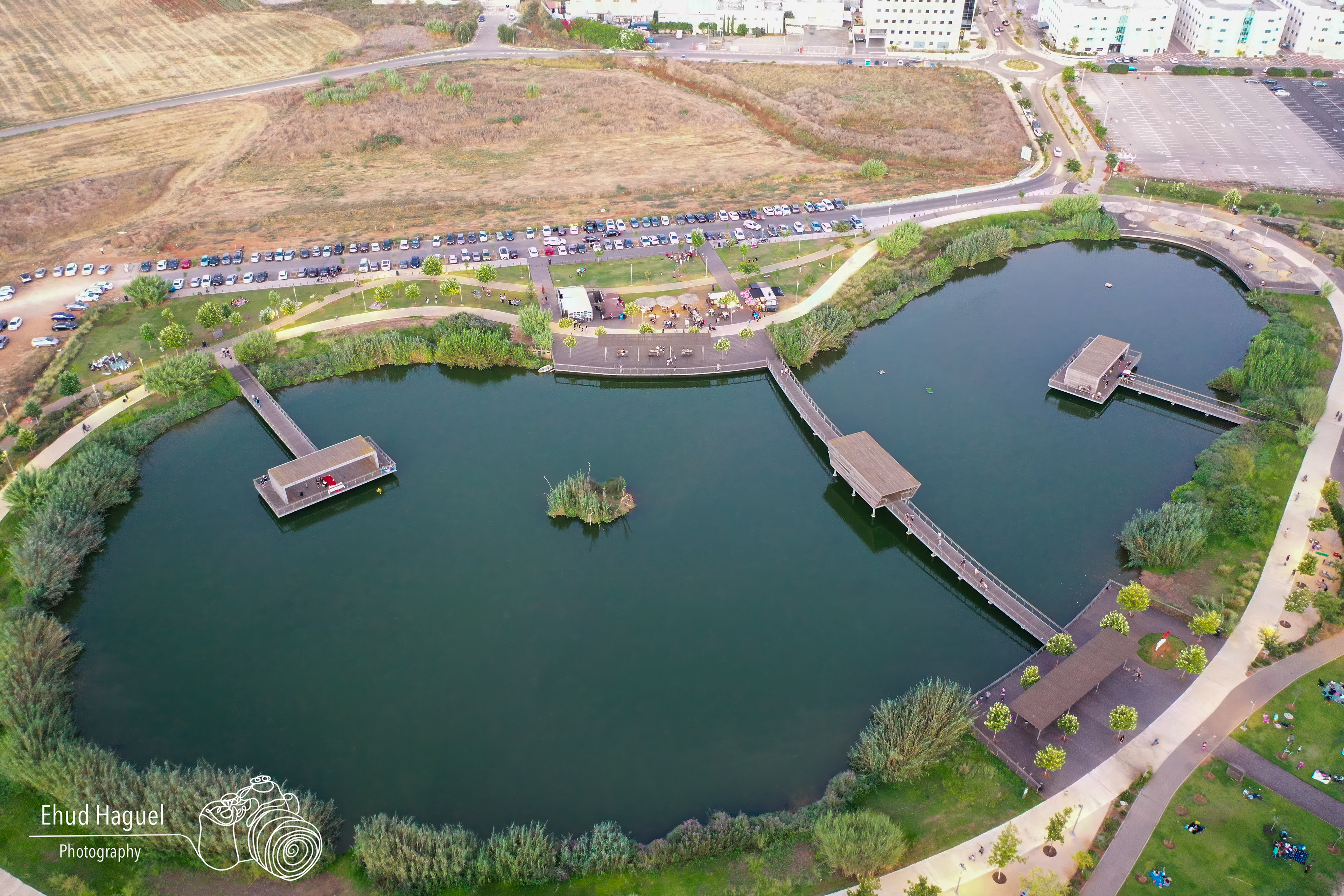 Aerial view of Hod Hasharon ecological park with pond, drone photography Israel