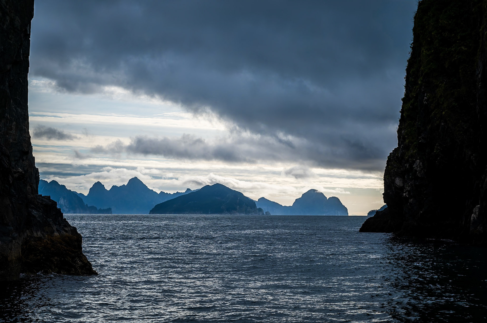 Clouds gather along the coast of Alaska's Resurrection Bay.