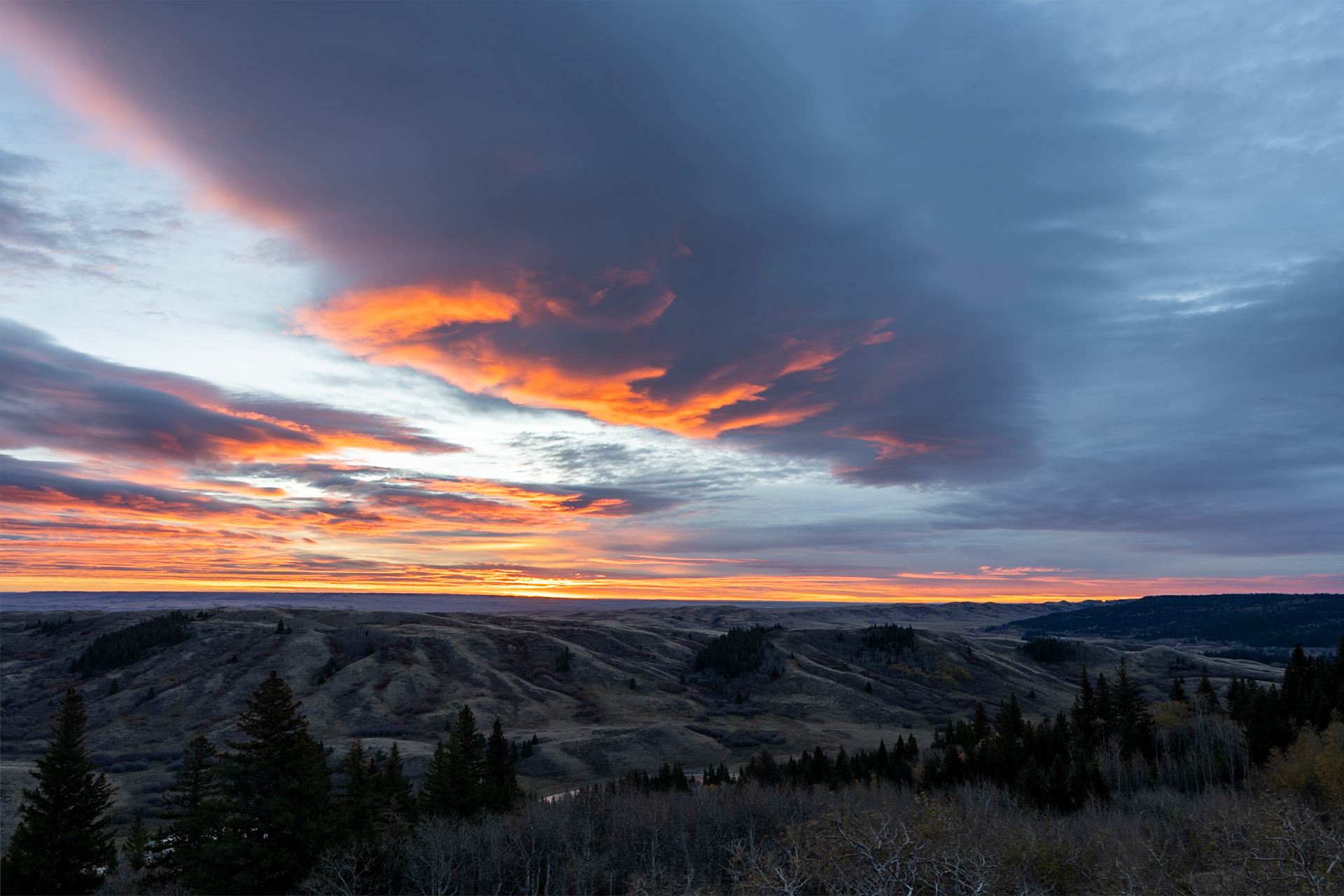 Sunrise over Conglomerate Cliffs in Cypress Hills Provincial Park, Saskatchewan.