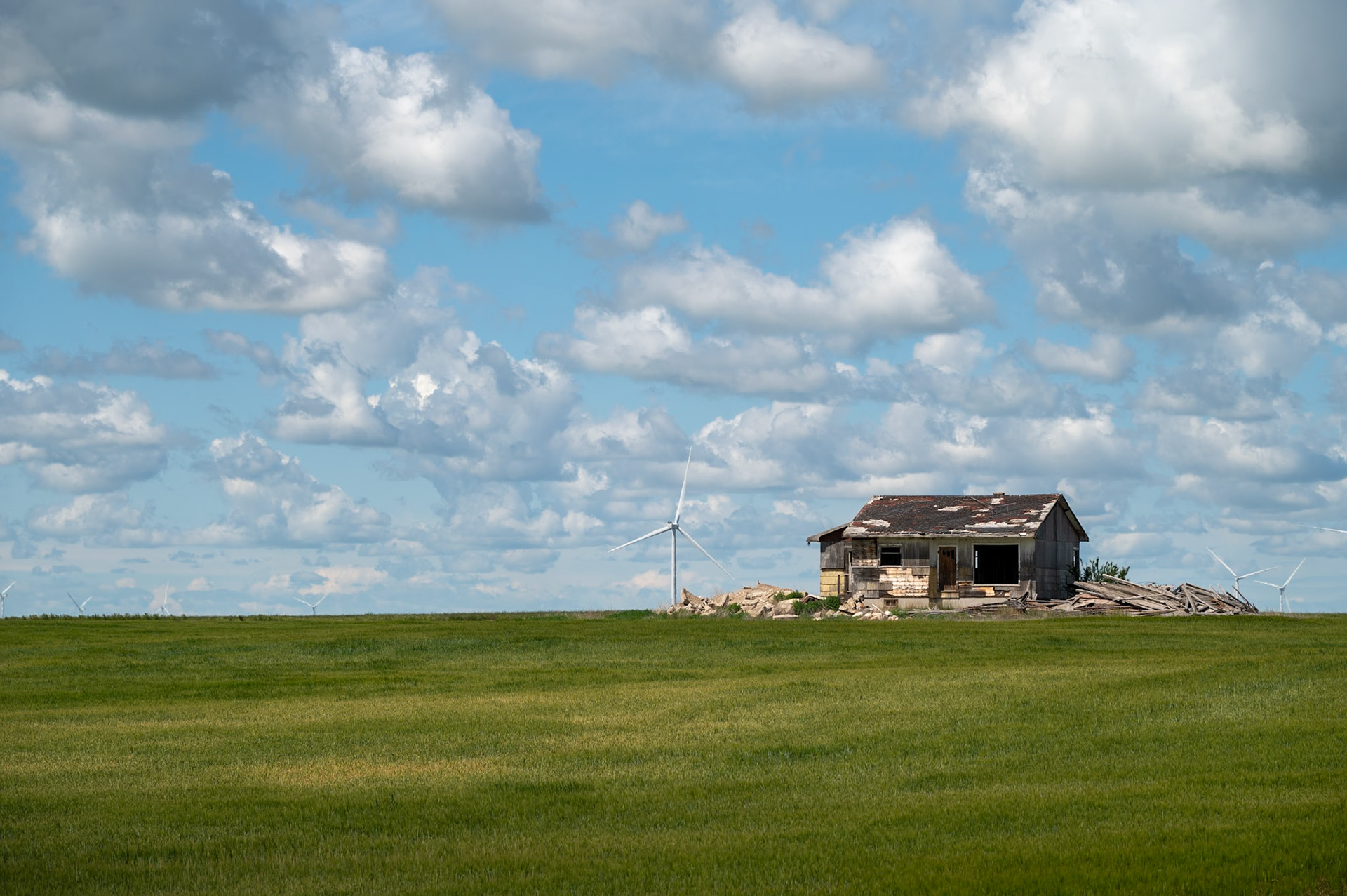 Rundown structure on the windswept prairies of southern Alberta.