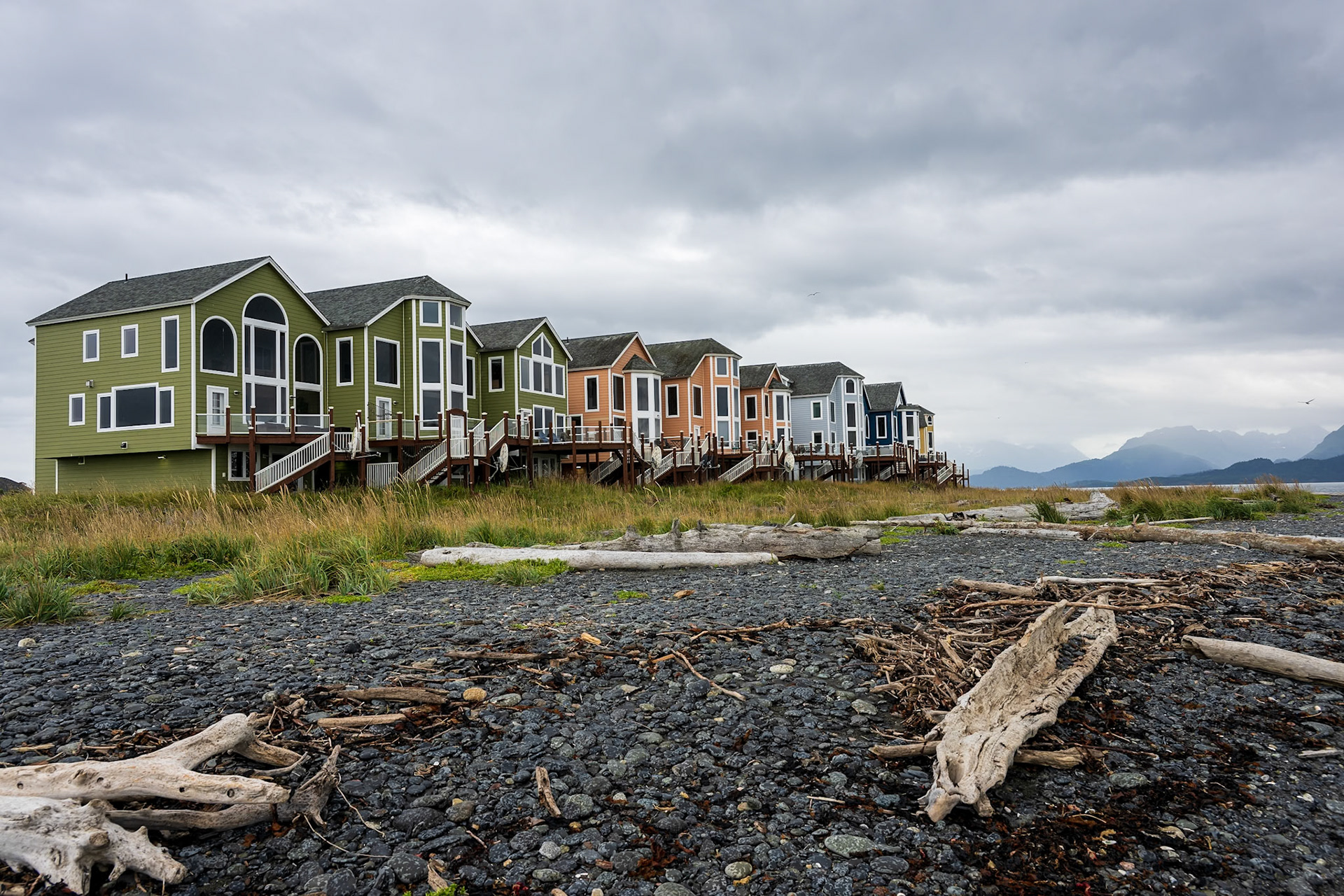 Vibrant homes along Homer Spit overlooking Katchemak Bay.