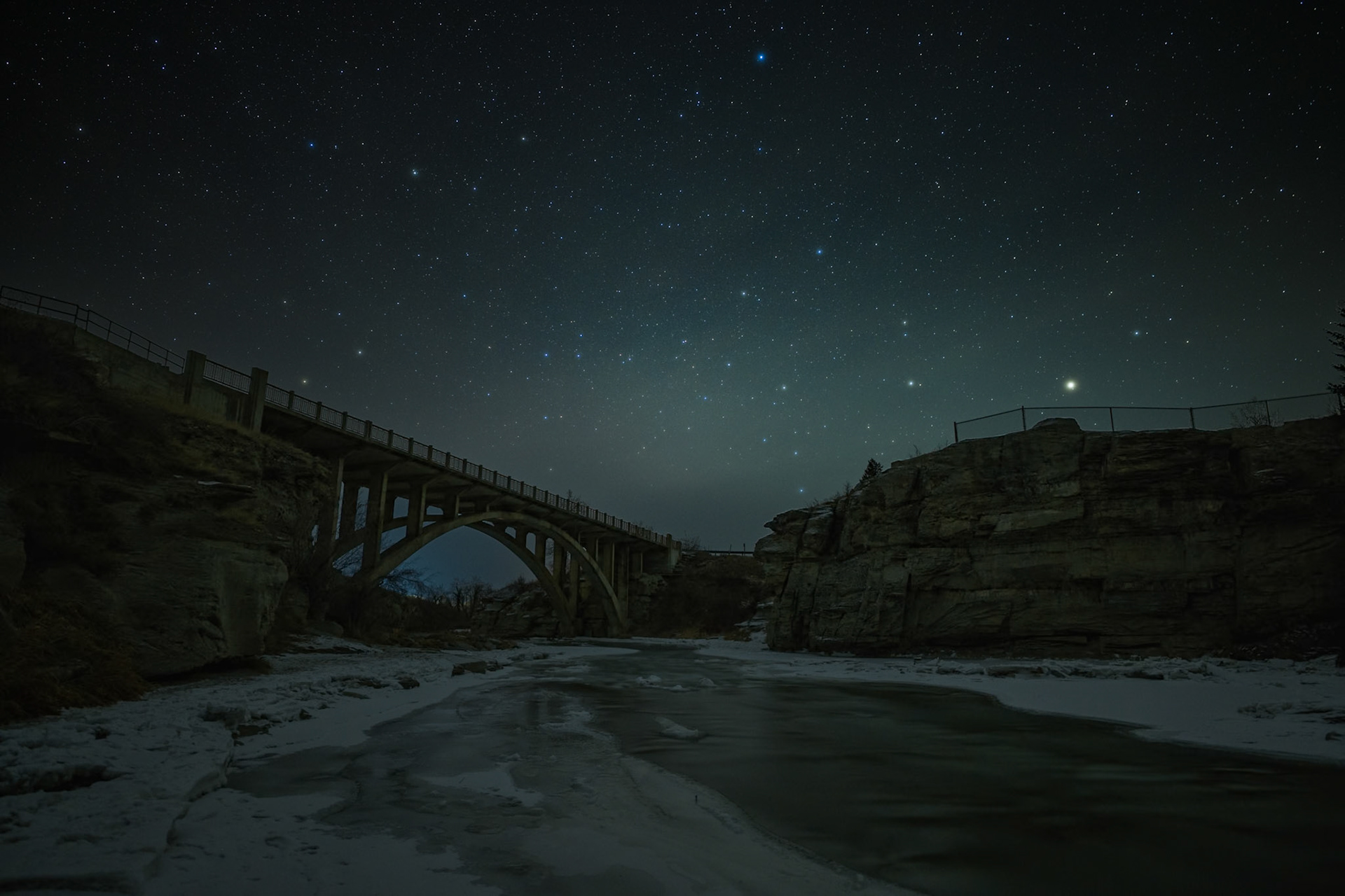 Starry winter night over Lundbreck Falls, Lundbreck, Alberta.