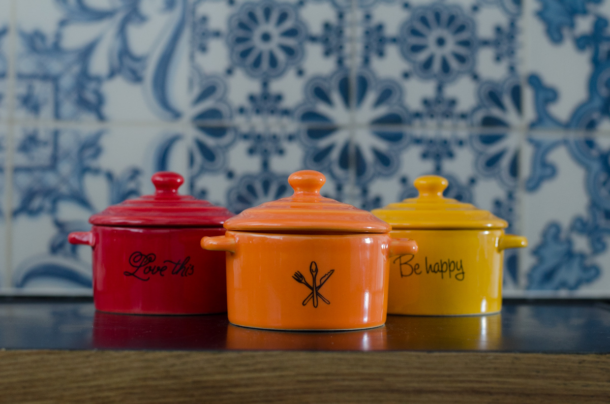 Customized mini casseroles in red, orange and yellow.