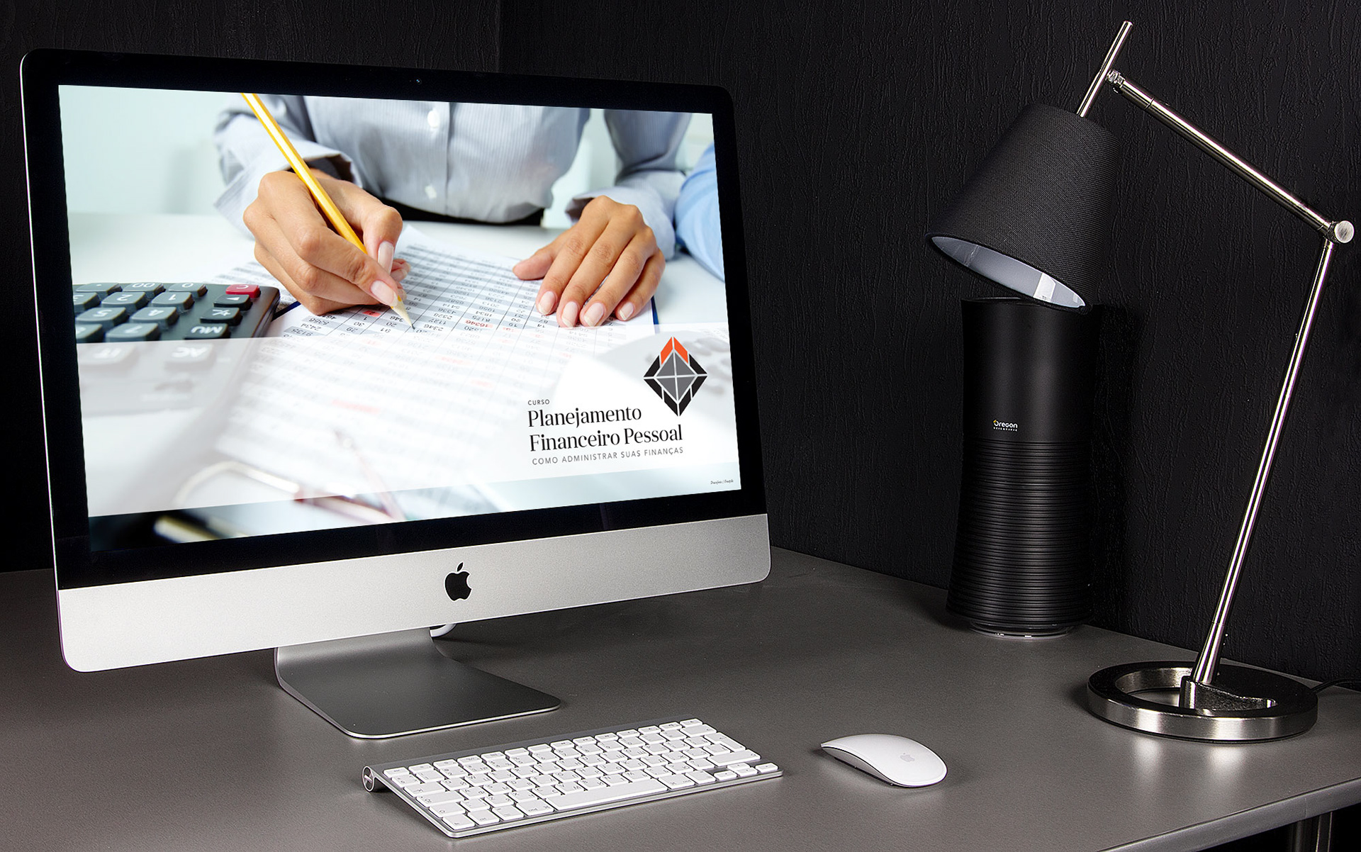 iMac with one of the PowerPoint slides designed for the Personal Finances Planning Course.