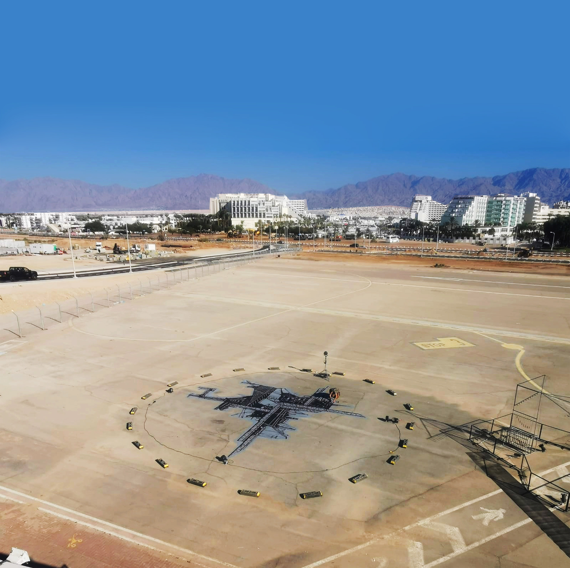 Shifting | on view | 2021 | Eilat's deserted Airport Runway exhibition | Industrial paint | 11x11m