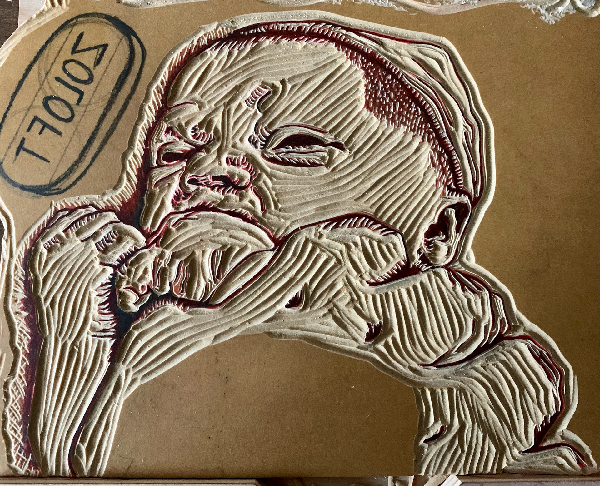 Linoleum portrait carving.