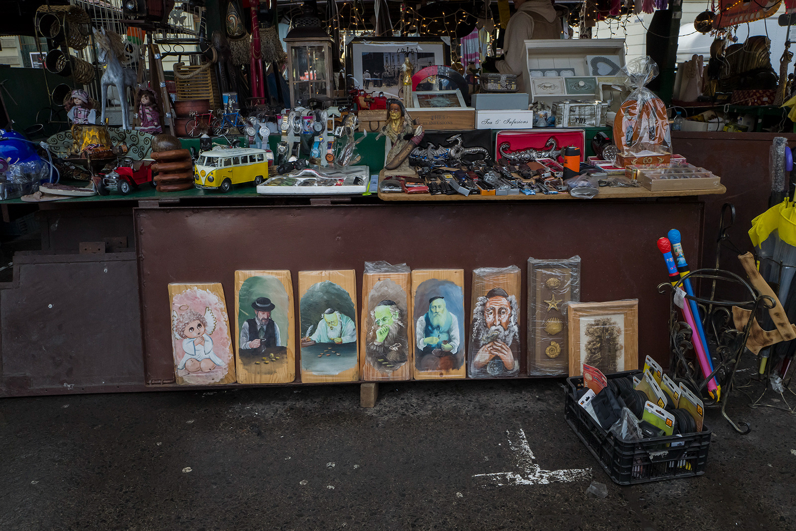 Lucky Jews for sale, Kazimierz, Kraków. Images of stereotypically religious-looking Jews holding coins are widely sold and collected.