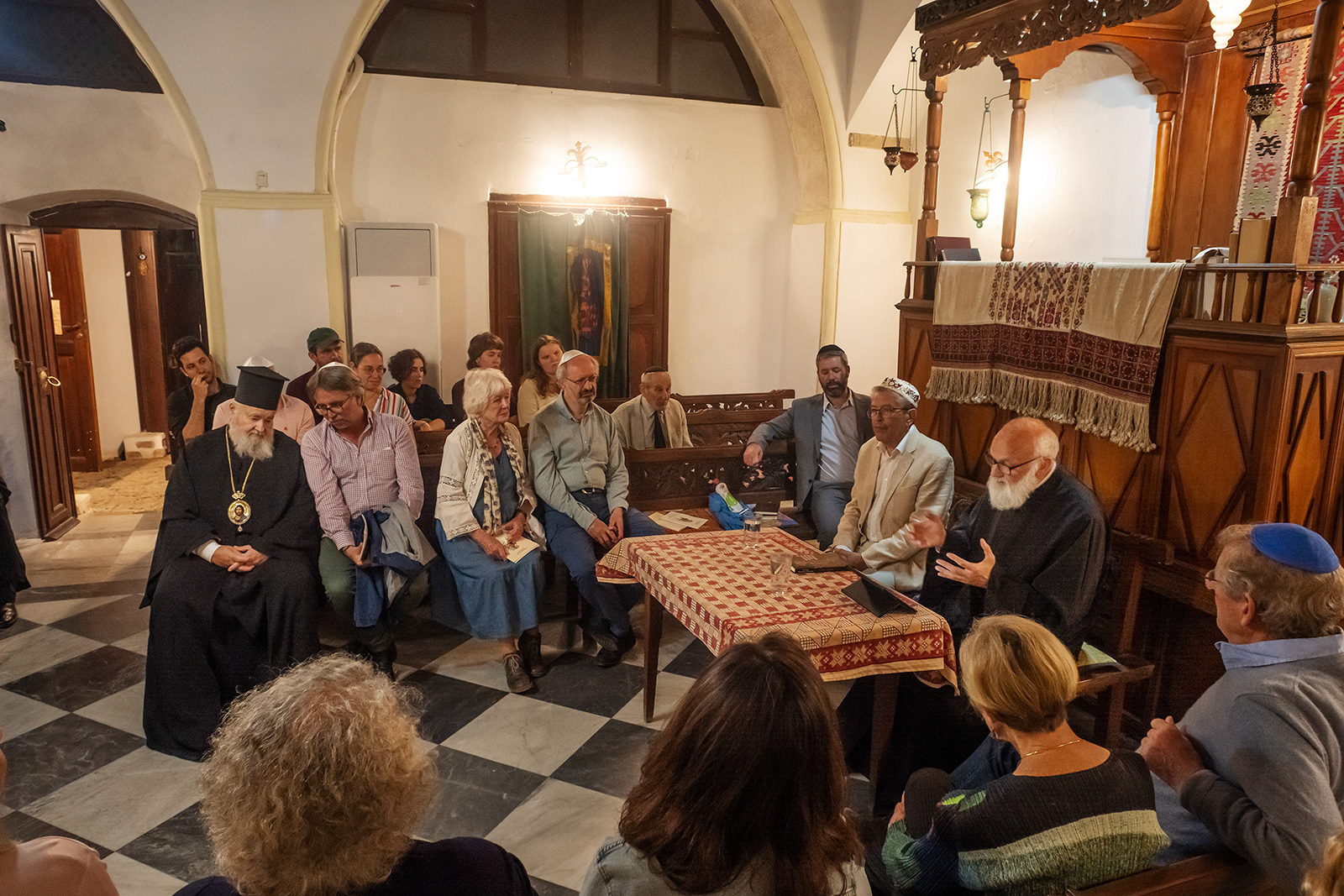 Jason Francisco / Shavuot at Etz Hayyim, study session with Rabbi De Lange and Father John Raffan, 2023. At the far left is the Metropolitan of Chania.