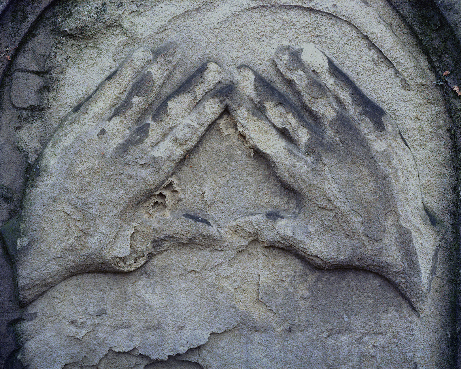 Hands making the priestly blessing, Miodowa St. Cemetery, Kraków