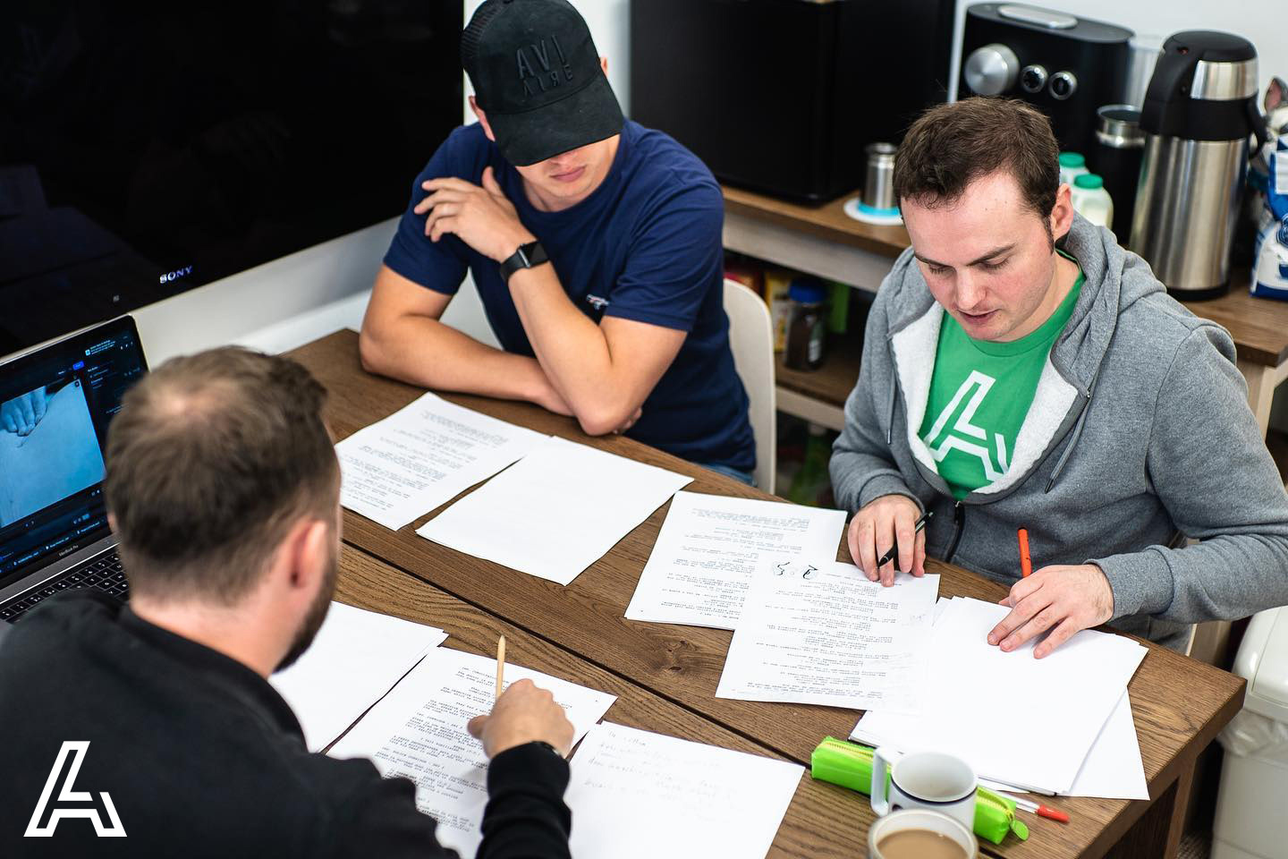 BTS snap of a briefing session with a client