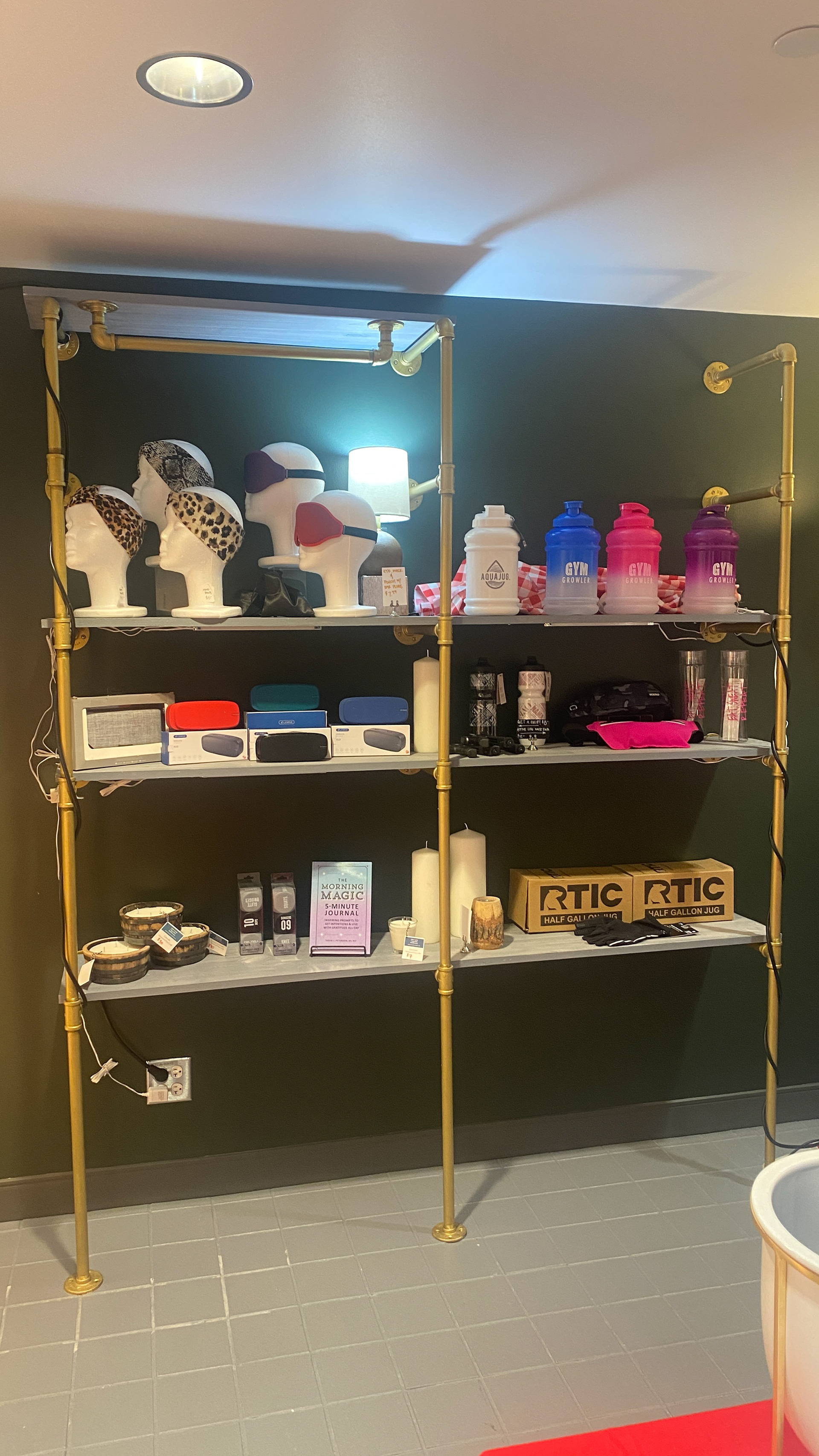 fitness related accessories; MP3 speakers, water bottles, and athleisure