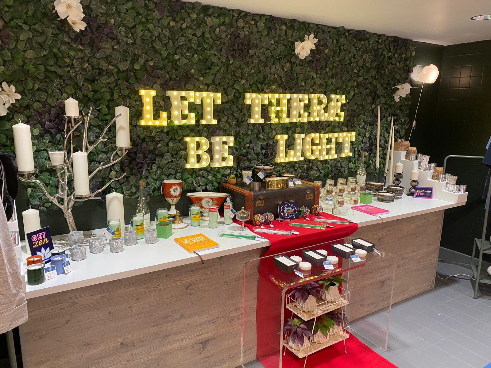 travel-inspired merchandise, floating candles, and vintage trays