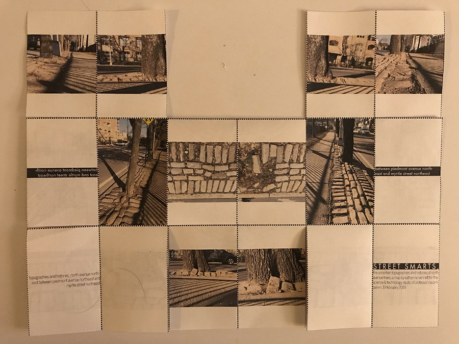 Folding version 1 is cut along the top and bottom center grid lines.