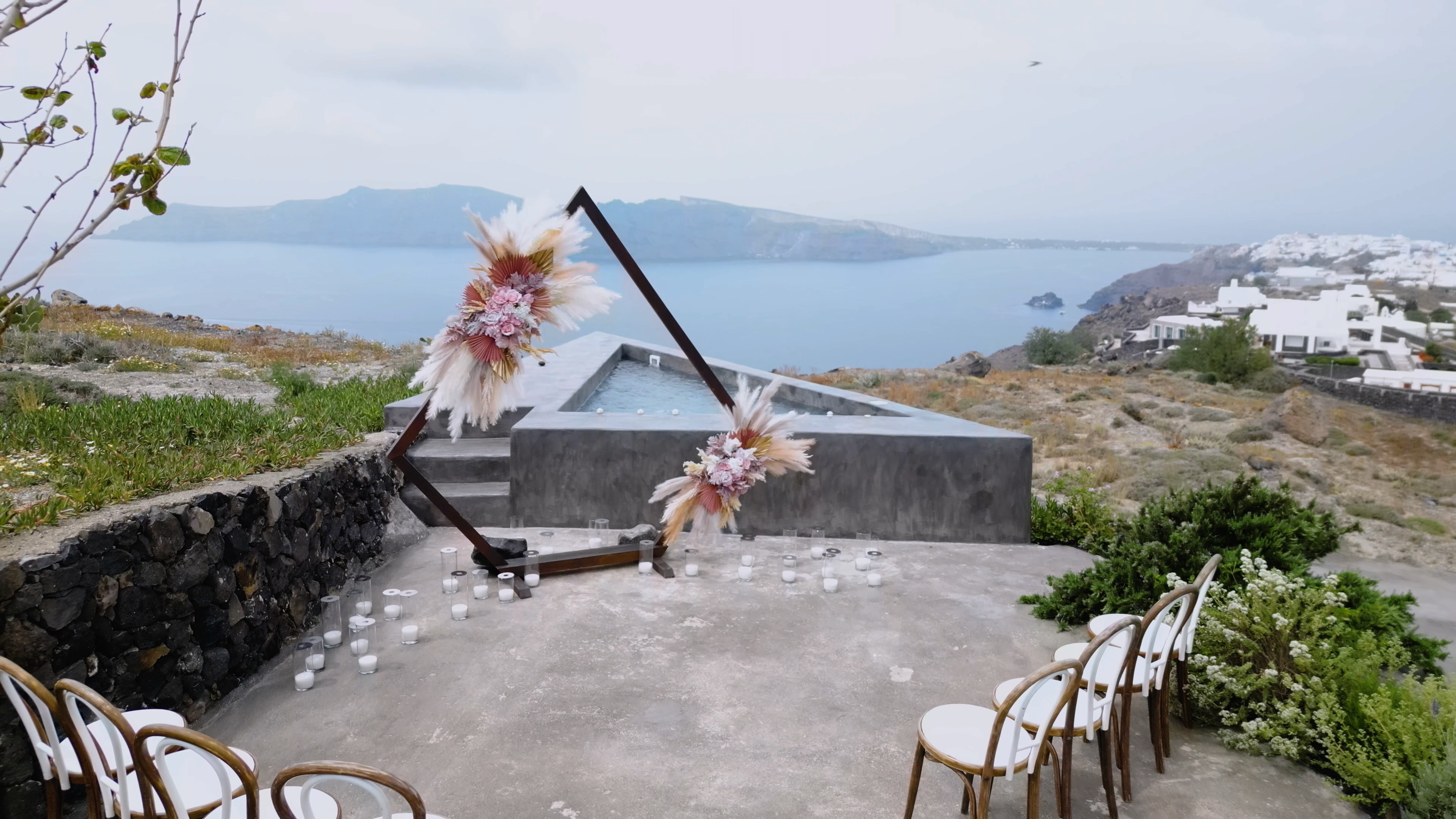 Drone shot of intimate villa in Santorini