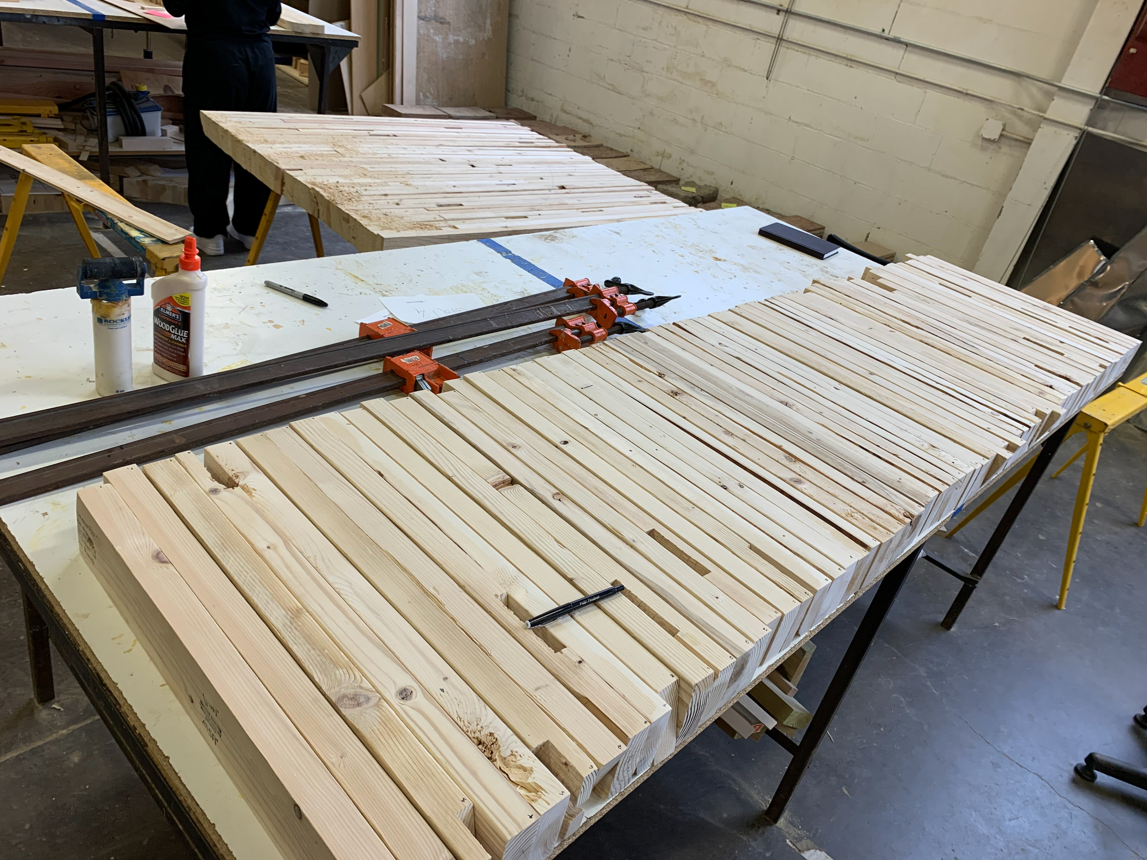 A jig of 58 plywood panels was set up to create bent laminated wood