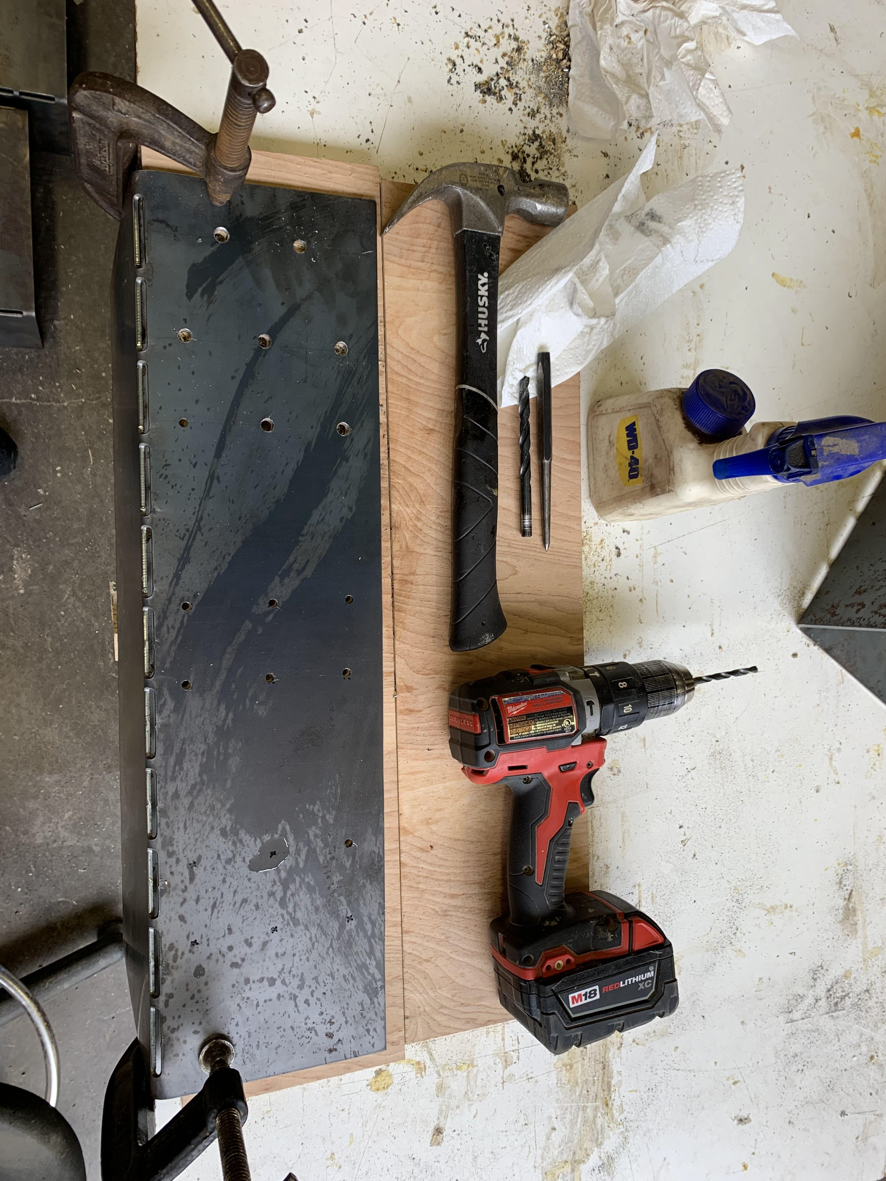 Steel plates were tested for tensile strength and then drilled for hardware connections