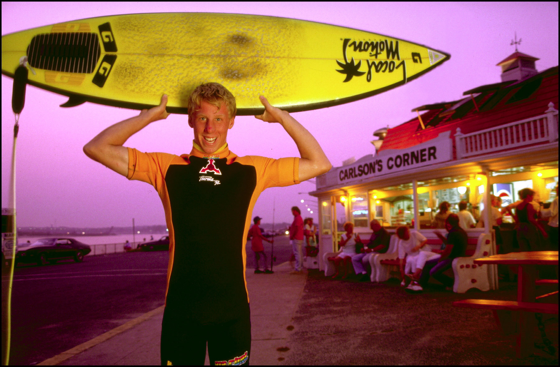 Surfer by a beachside snack bar in Manasquan, New Jersey.