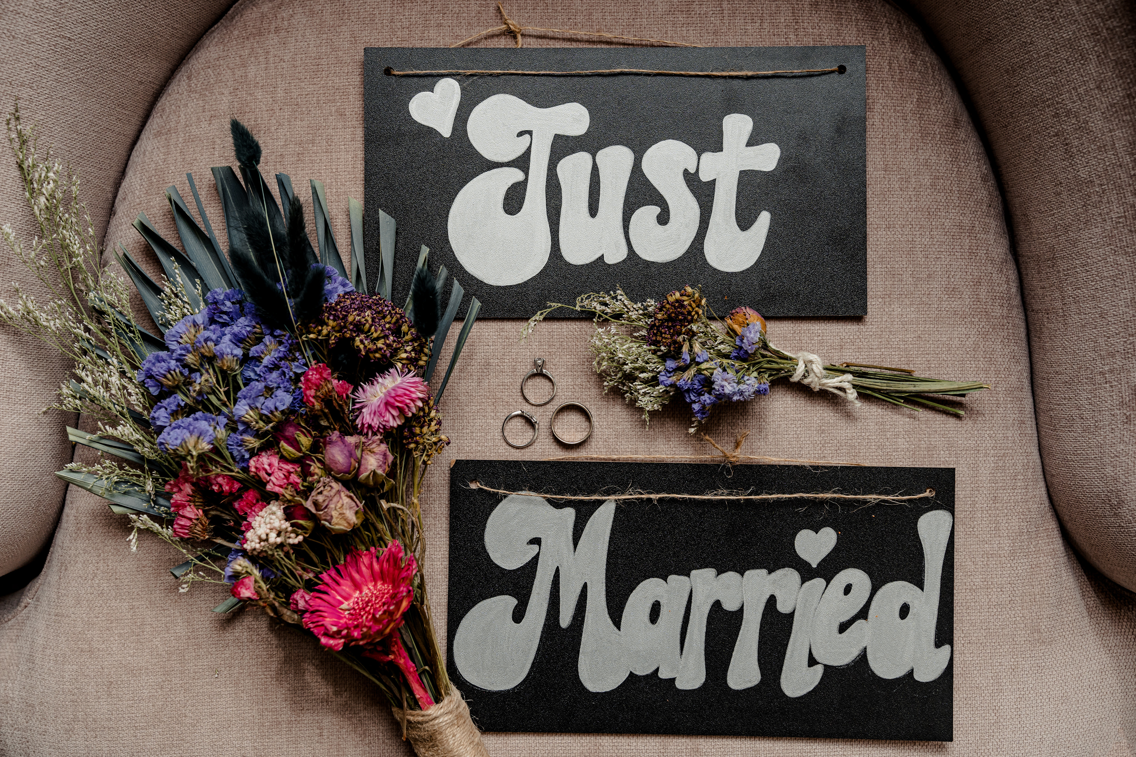 Fun Fact: I hand-painted the "just married" sign myself! Photo by Ethan James Rivera