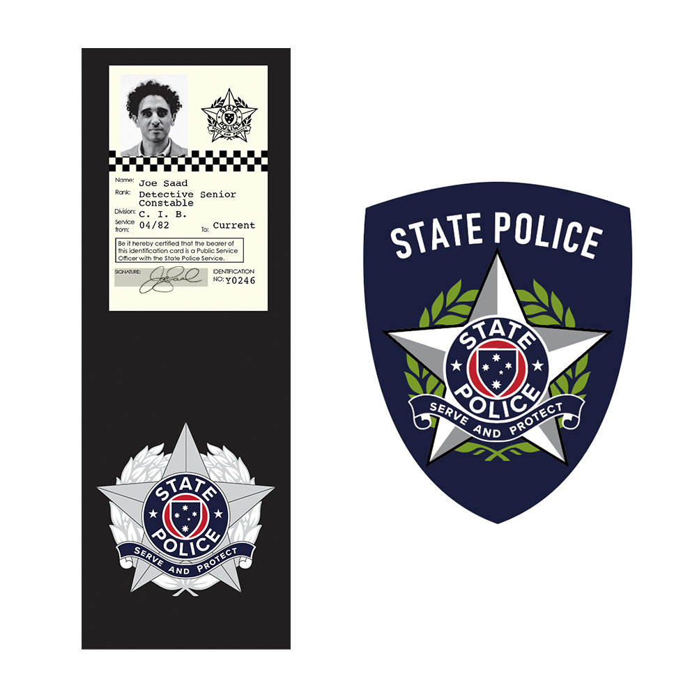 Designs for police badge, ID card and shoulder patch including police crest design