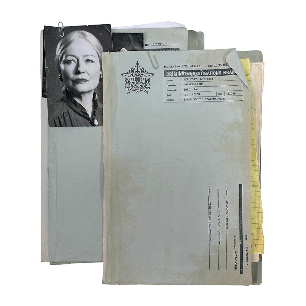 Old and aged police folders including police crest design