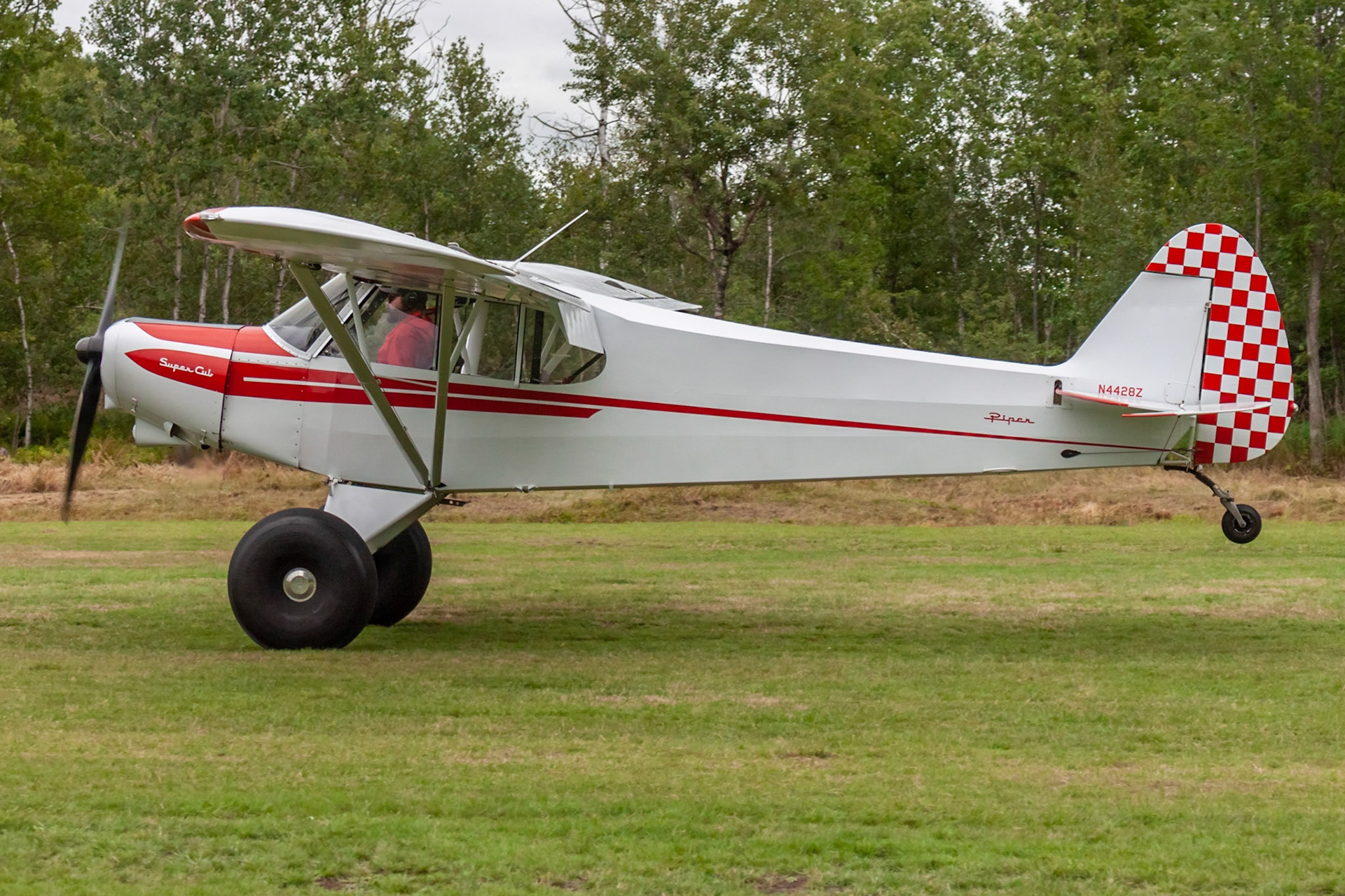 Piper PA-18-150 Super Cub (N4428Z, c/n 18-8766) at the STOL competition during the 33rd annual Bowman Field (B10; Livermore Falls, ME) Fly-in on 2019-08-24.