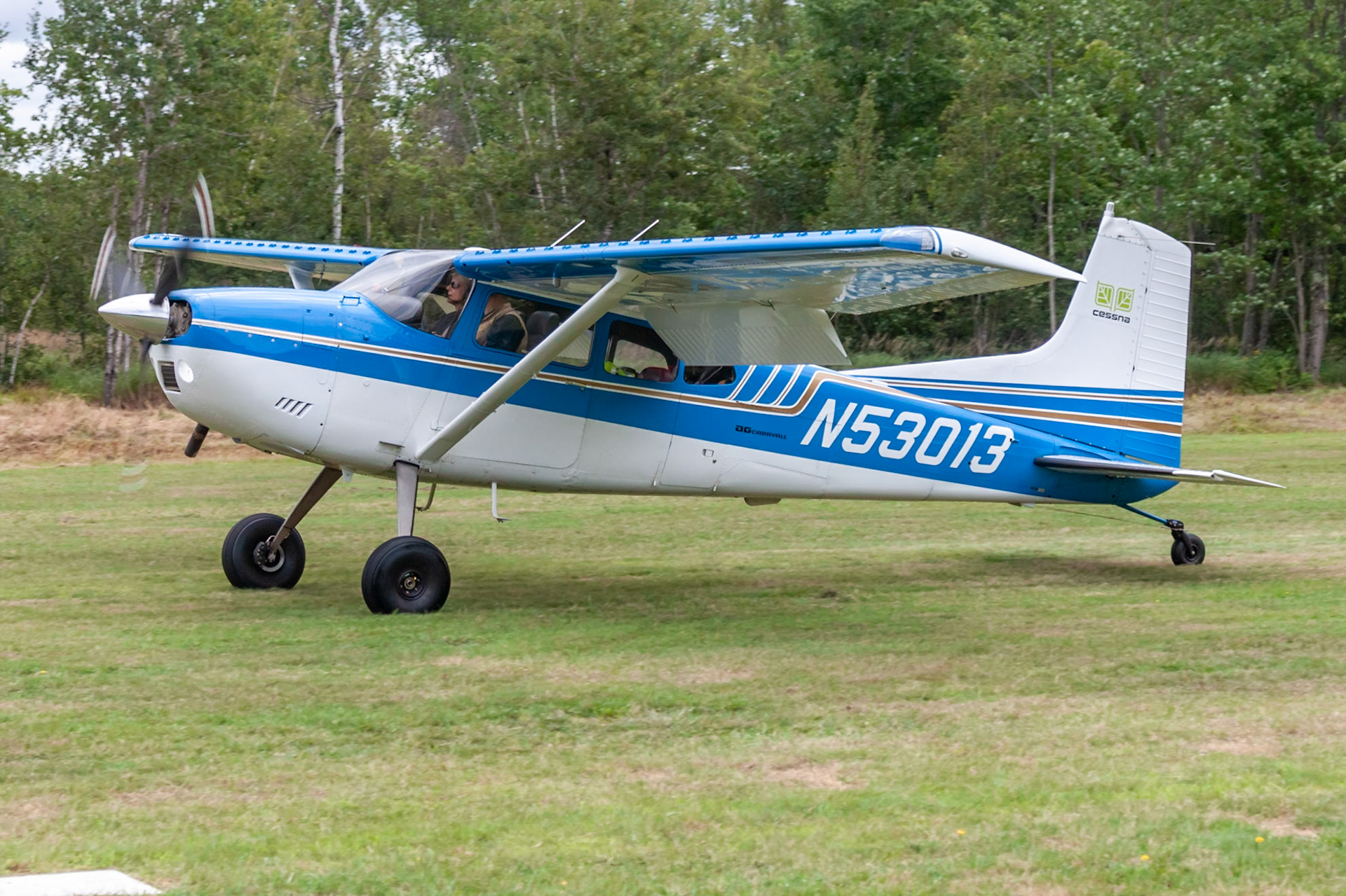 Cessna A185F (N54013, c/n 18502317) at the 33rd annual Bowman Field (B10; Livermore Falls, ME) Fly-in on 2019-08-24.