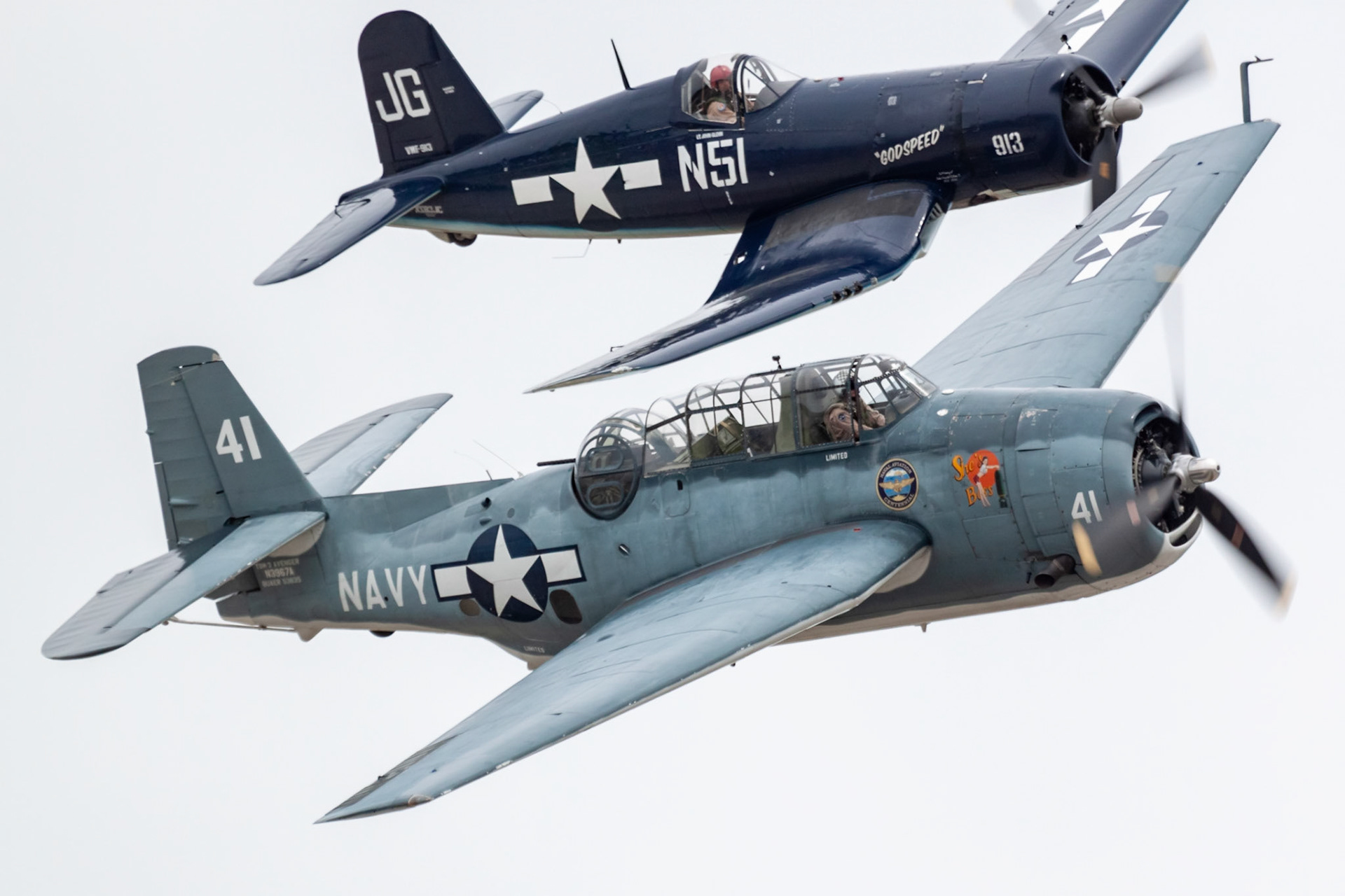 Grumman TBM-3U Avenger (N3967A, BuNo. 53835, "She's the Boss") in formation with Goodyear FG-1D Corsair (N83JC, BuNo. 67089, "Godspeed") during the Rhode Island Air Show at the Quonset Point ANGS on 2018-06-10