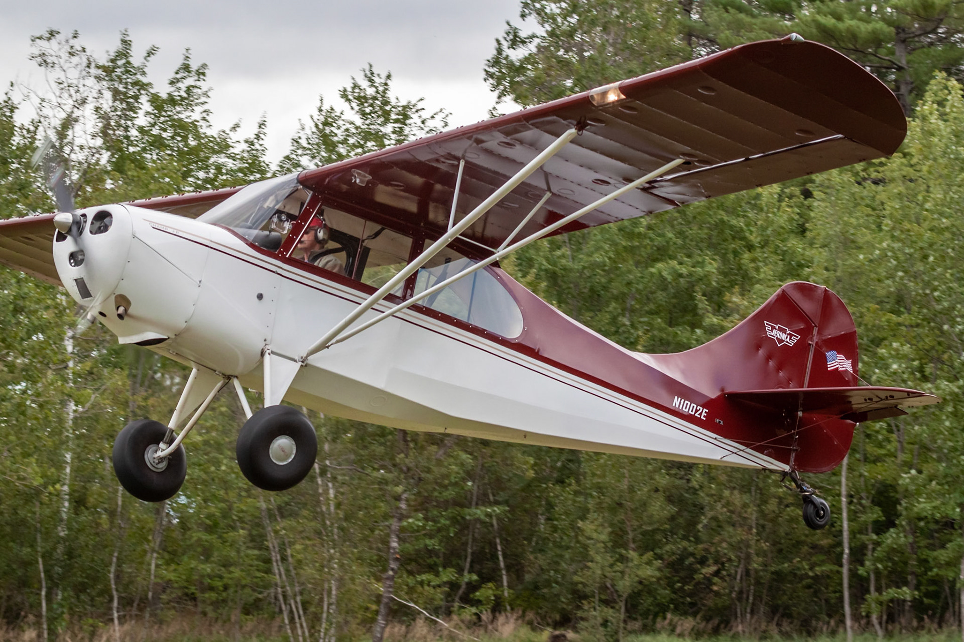 Aeronca 7AC Champion (N1002E, c/n 7AC-4552) at the 33rd annual Bowman Field (B10; Livermore Falls, ME) Fly-in on 2019-08-24.