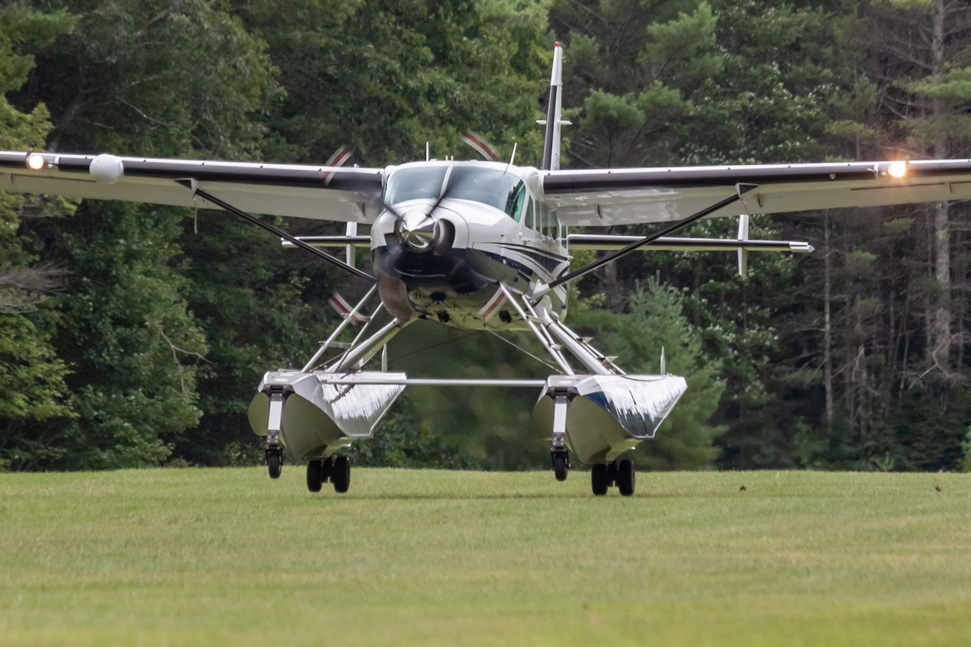 Cessna 208B Grand Caravan Amphibian (N208WF, c/n 208B1042) equipped with Wipaire floats at the 33rd annual Bowman Field (B10; Livermore Falls, ME) Fly-in on 2019-08-24.