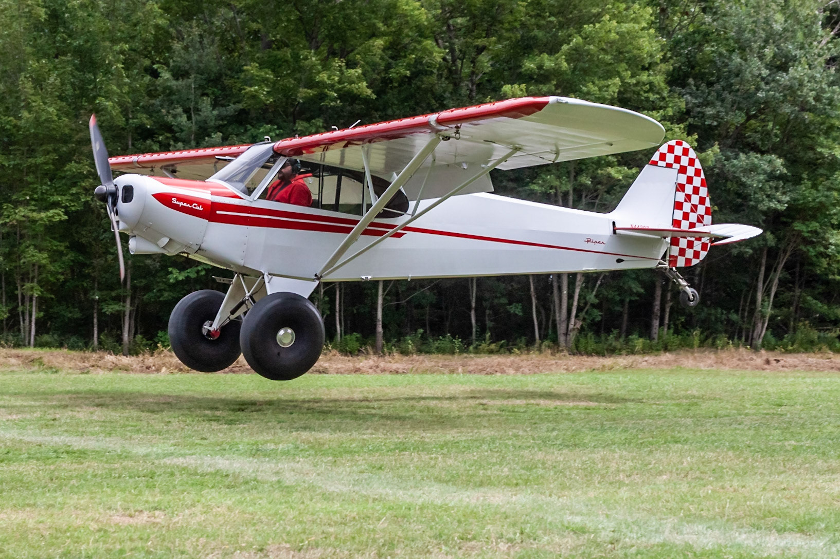 Piper PA-18-150 Super Cub (N4428Z, c/n 18-8766) at the STOL competition during the 33rd annual Bowman Field (B10; Livermore Falls, ME) Fly-in on 2019-08-24.