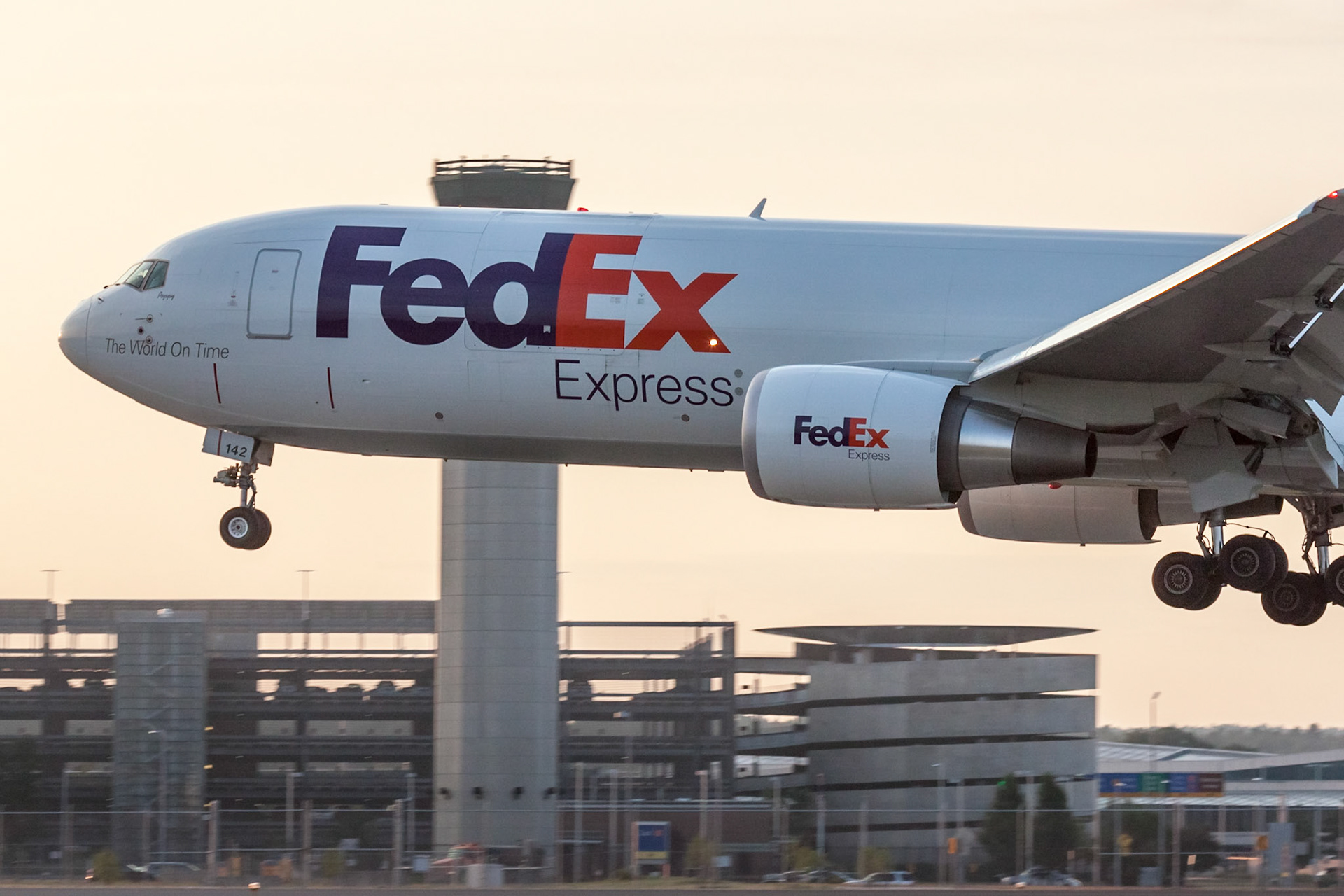 Boeing 767-300F (N142FE, c/n 42725, nicknamed 'Poppy') of FedEx landing early in the morning at KMHT on 2017-08-11; see SMA vol 2 page 80