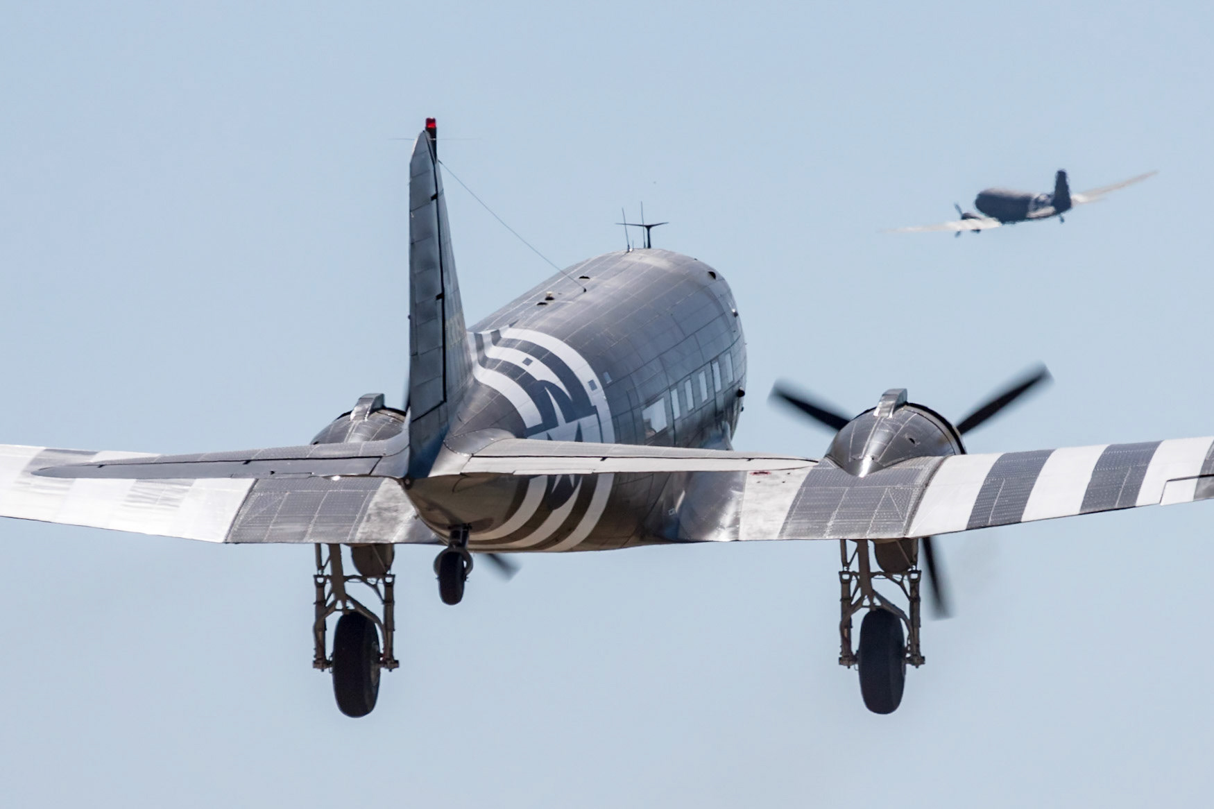 Douglas C-47A-60-DL (N62CC, c/n 13798, “X5-J”, 43-30647, “Virginia Ann”) taking off for a 3-ship formation demonstration; Flabob Airport, Riverside, CA, 2017-05-20.