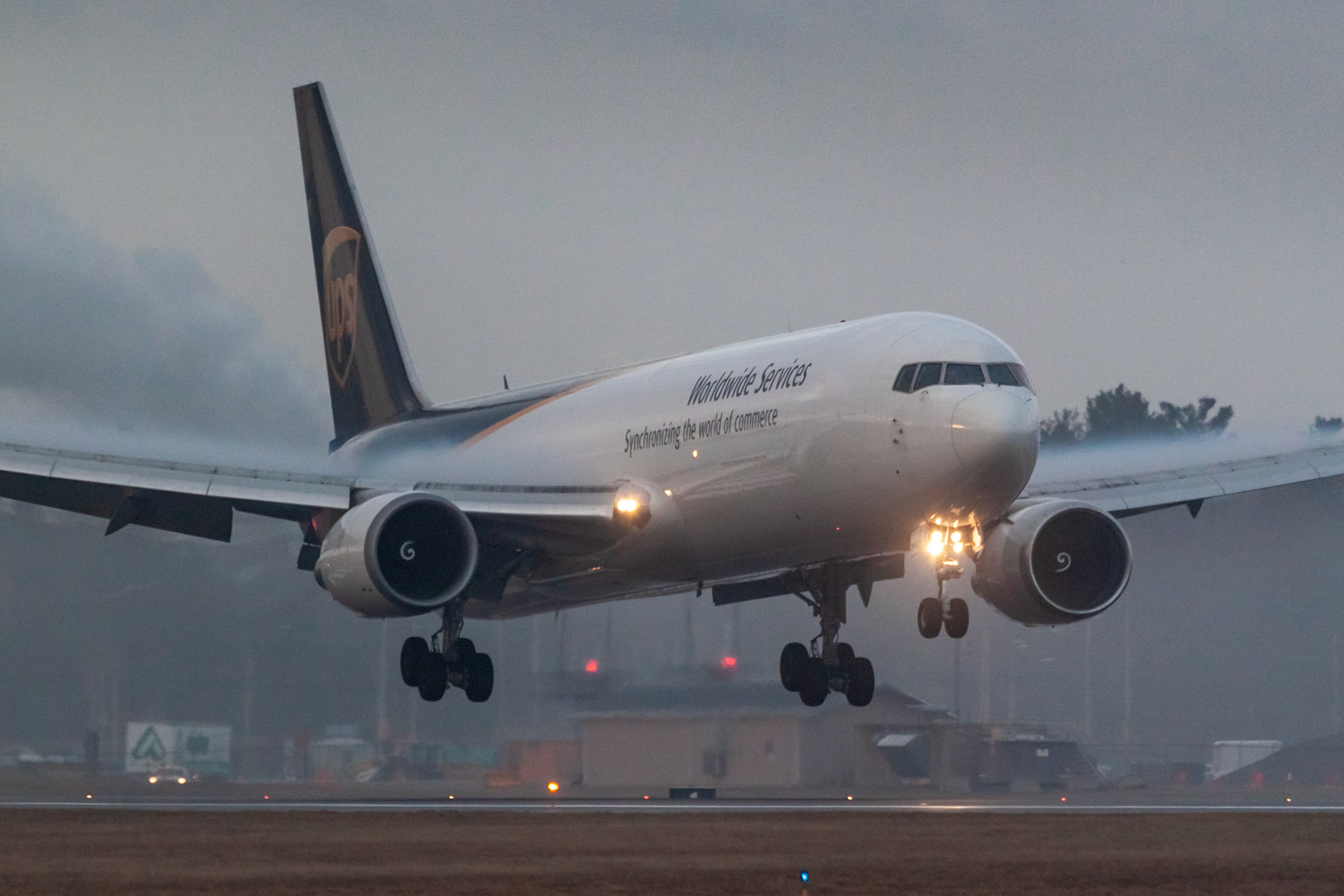 Boeing 767-34AF (N342UP, c/n 37865) of UPS landing at KMHT on 2019-04-19