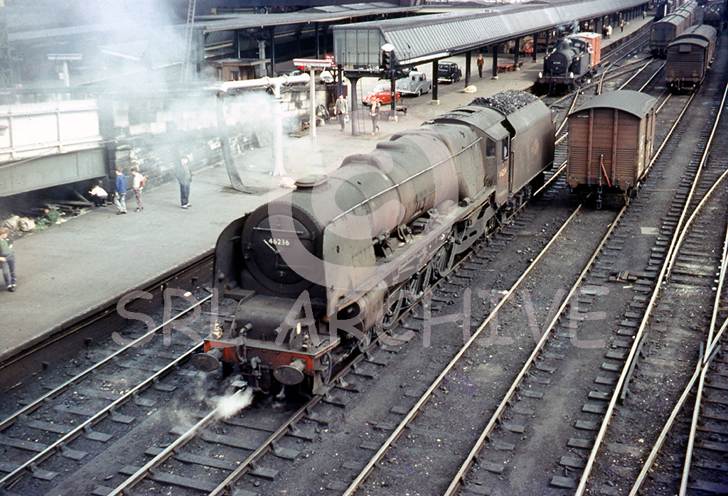 46236 City of Bradford at Carlisle station waiting to take over an express for the north 13th August 1963 SRL No 232