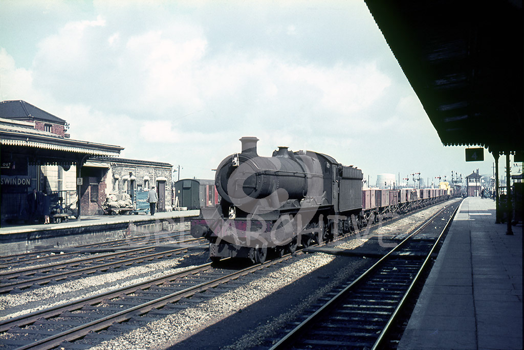 6993 'Arthog Hall' Hawksworth Modified Hall at Swindon with a class H freight 7th April 1965 SRL No 347 