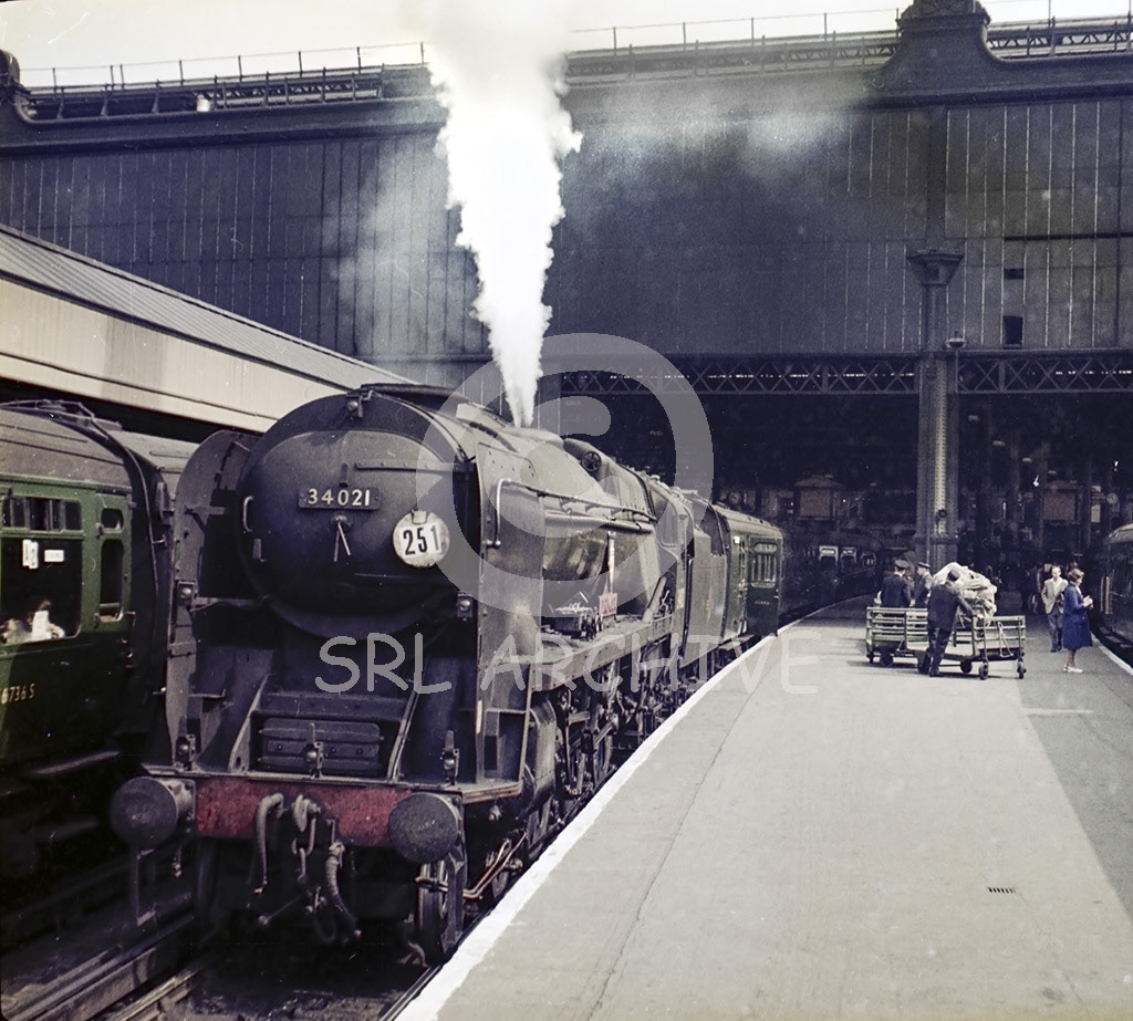 34021 'Dartmoor' at London Waterloo station with the 10.54 to Basingstoke in 1965 SRL No 1027 