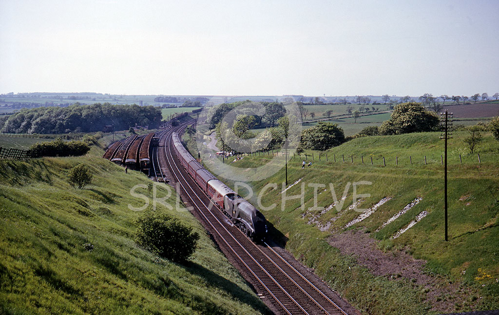 60008 'Dwight.D.Eisenhower' on a Leeds-London Kings cross express near High Dyke and about to enter Stoke Tunnel north of Grantham 8th June 1963 Alan.John.Clarke/SRL No 684 