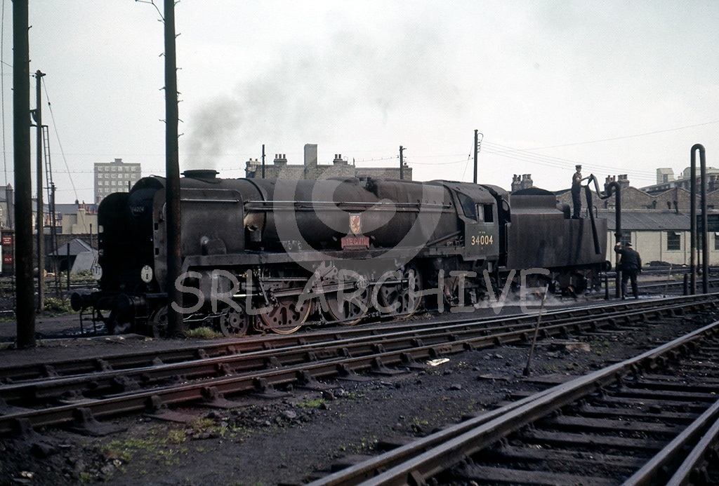 34004 'Yeovil' in filthy condition at Nine Elms 12th September 1966 SRL No 335 