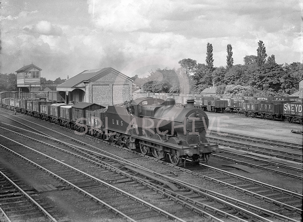 Fowler LMS 4F 0-6-0 No 4248 at Castle Ashby & Earls Barton station heading west on the Northampton-Peterborough line in the 1930's. Renumbered 44248 by BR in late 1951 and remained in service until withdrawn from 16E Kirkby in Ashfield in September 1964 George John Drysdale/SRL No 206 